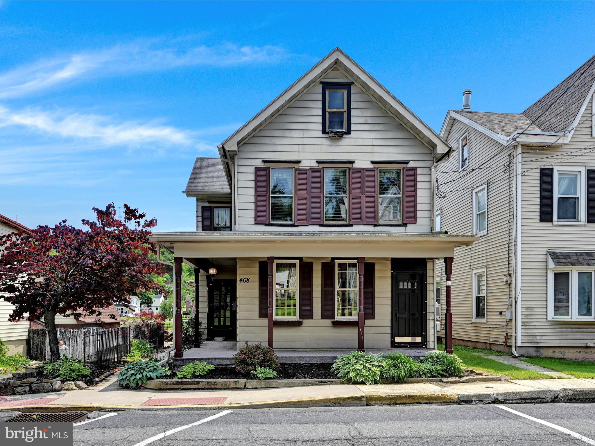 Welcome to this inviting and character-filled home that borders the serene Bubeck Park—complete with a picturesque dam, swans, ducks, great fishing opportunities and a bait shop right next door! This timeless residence blends vintage charm with thoughtful updates, including a newly renovated front porch and brand-new living room windows.
Step inside to find hardwood floors throughout most of the home and a cozy living room featuring a propane fireplace—perfect for chilly evenings. The first floor includes a convenient half bath and a functional layout ideal for both everyday living and entertaining.
Enjoy outdoor living at its best with a deck overlooking the park and a covered front porch perfect for morning coffee or relaxing evenings. An oversized garage offers ample space for parking or could serve as a workshop or home-based business, thanks to the property’s flexible residential/commercial zoning.
Whether you're looking for a unique home, a business opportunity, or both—this property offers unmatched potential in a truly idyllic setting.