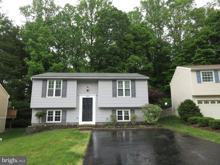 Beautifully updated single family detached home located on a quiet cut de sac in a park like setting. 2 bedrooms up and 1 full bath on the main level with a large lower level bedroom with walk in closet and full bath down stairs. Large  open Main level living room with eat in kitchen that opens to Huge rear deck. Lower level family room. Updated baths. Newer kitchen. New light fixtures. It Shines!