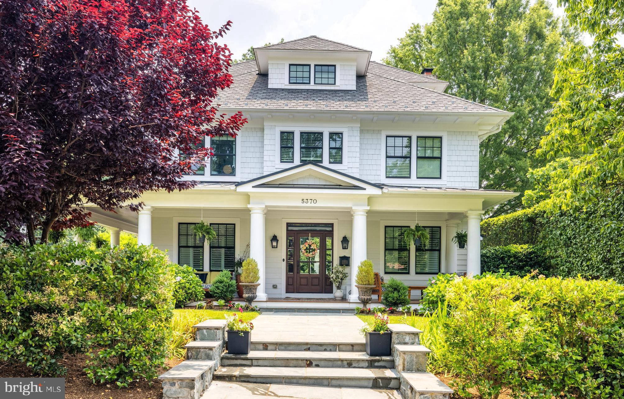 Nestled in one of the most coveted neighborhoods in North Arlington, this custom-built Southern-style foursquare home stands as a testament to timeless elegance and meticulous craftsmanship. With its distinctive features and carefully selected design elements, this residence offers an unparalleled blend of southern charm, luxurious amenities, and a prime location that is close to all essential amenities. From the wide, wrap-around porch to the exquisite interior details, this home is truly one of a kind.
As you approach the property, the first thing that captures your attention is the wide, wrap-around porch with 8-foot mahogany decking. This expansive porch is a hallmark of Southern architecture, offering a welcoming space to relax, entertain, and enjoy the outdoors. Whether it's sipping iced tea on a warm summer evening or hosting a gathering, this porch provides an ideal setting. The attention to detail and quality craftsmanship is evident in every aspect of the exterior design, making this home a true standout.
Step inside, and you'll find a world of refined elegance. The high ceilings and dark walnut floors create an atmosphere of grandeur, while the abundance of natural light adds warmth and vibrancy to the space. The dining room is adorned with huge French doors that open outward onto the porch, seamlessly blending the indoor and outdoor areas for a captivating entertainment experience with wired speakers connected to both the interior and exterior of the home.
The gourmet kitchen is a culinary enthusiast's dream come true. It opens up to the family room, allowing for easy interaction and creating a perfect space for family gatherings and entertaining guests. The kitchen boasts top-of-the-line appliances, custom cabinetry, two dishwashers, and ample counter space for meal preparation. Every detail has been carefully considered to provide both functionality and style, making this kitchen a centerpiece of the home.
Connected to the family room is a screened-in porch, offering a tranquil retreat that allows you to enjoy the outdoors while being protected from the elements. This extension of the living space further enhances the seamless indoor/outdoor flow, allowing for year-round enjoyment and creating an oasis of relaxation.
The charm and character of the Southern-style architecture permeate every inch of this home. Chair-rail molding adorns the walls, evoking a sense of tradition and sophistication. Crystal chandeliers, with matching door knobs throughout, add a touch of elegance and sparkle. The meticulous attention to detail ensures that the home retains its timeless appeal and offers a welcoming ambiance to residents and guests alike.
With five bedrooms, each featuring an en-suite bathroom, this home provides ample space for comfort and privacy. The bedrooms are designed with the same level of sophistication and attention to detail as the rest of the house, offering a serene retreat at the end of each day. The bathrooms are impeccably appointed, showcasing high-quality fixtures and luxurious finishes that create a spa-like experience.
In addition to the main residence, this property includes a one-car detached garage with an unfinished upper level. This space presents endless possibilities for customization, whether it be transformed into a private gym, a media room, or an additional living area.
The walk-out basement of this remarkable home offers an ideal space for game-watching, complete with a bedroom suitable for guests or an au pair. The basement showcases charming brick floors and an exquisite bar, creating a cozy and inviting atmosphere for entertainment and relaxation.
Located in one of the most sought-after neighborhoods in North Arlington, this home offers convenient access to a plethora of amenities. Its close proximity to Downtown DC, airports, metro stations, shopping centers, parks, Tysons, and restaurants ensures that residents can easily access all the attractions the area has to offer.