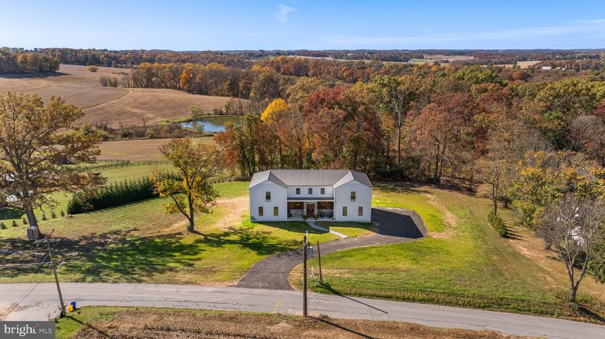 OPEN SUNDAY Nov 10th 1-3 pm. GORGEOUS NEW BUILD in PARKTON! From the ground up, 2225 Traceys Store Road, a One-of-a-kind, MAGNIFICENT Custom Home,  CONSTRUCTION ALMOST COMPLETE, not only uses energy efficient building materials, it goes well beyond; with the foundation made from insulated concrete forms (ICF), to the continuous envelope spray foam insulation, to Geothermal heating, cooling, and hot water; All of which provide unparalleled energy efficiency, GREC payments and a specific tax relief. This EXQUISITE 4-bedroom, 4.5-bathroom Home situated on a gorgeous, picturesque 1.55-acre lot, boasts over 4500 square feet of finished living space! Reclaimed architectural gems throughout the house all have individual stories that we hope can add to your story!  From the hardwood floors to the interior and exterior doors and hardware, to the columns supporting the covered porch; this is truly a blend of modern design utilizing materials and elements of the past. As you enter this INCREDIBLE Home through double 10’ Mahogany Doors c1890 into a vestibule, you come face-to-face with history reimagined for today’s lifestyle. The reclaimed Douglas Fir and Heart Pine Hardwood Floors in a STUNNING Herringbone design welcome you. A GRAND 12’ x 4’ island in the open kitchen and GORGEOUS custom cabinetry throughout showcase the exceptional craftsmanship and builder’s eye for detail and design. The 9' ceiling height throughout adds to the GRAND feel of this special home. The main level floor plan features a lovely foyer, open kitchen with walk-in pantry and double door access to both a covered and open deck, large light-filled family room, spacious living room/library/study with a fireplace, and a mudroom with built-in cubbies with access to an awesome oversized 2.5 car garage. The STUNNING upper-level owner’s suite is not only spacious, it also offers incredible views of the countryside, a wonderful large walk-in closet and fabulous ensuite bath. Three additional sizable bedrooms, another with an ensuite bath, a hall bath and terrific laundry room round out the upper level. The FINISHED Walk-out Lower Level has a large window for natural light, another full bath and plenty of space for fun and entertainment! The exterior and roof are made with MAINTENANCE FREE standing seam look premium metal siding and the windows are Black Anderson Casement windows. This INCREDIBLE home is AVAILABLE IMMEDIATELY  FOR TOURS. Your new home awaits! SCHEDULE YOUR SHOWING TODAY! Welcome Home!