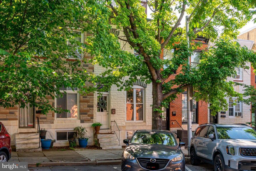 Welcome to a thoughtfully updated row home in the heart of Canton, featuring a rooftop deck, private oversized parking pad, and multiple indoor and outdoor living spaces.  

The main level has been beautifully renovated and offers a living room, dining room, and updated kitchen with granite countertops and access to both the basement and rear yard. The fenced in patio leads out to the oversized parking patio while the two story roof deck offers additional outdoor living and entertaining space. Upstairs offers two bedrooms and one full bathroom. The primary bedroom features a large walk-in closet along with beautifully whitewashed exposed brick. The renovated full bath has a walk in shower, claw foot tub, and wainscoting detail. Skylights bring additional light into the upper level and the second bedroom provides access to the roof top deck with views of the harbor and the iconic Natty Boh  sign. 

The lower level features a large finished open space ideal for a home office, guest area, gym, or secondary living space. Attached is a spacious utility room complete with a small half bath and additional storage potential. A sump pump has also been added to the basement.


Additional improvements include a roof resealed, furnace replacement in 2017, water heater replacement in 2020, sump pump installation, and charming renovations throughout the home.


Positioned moments from Canton Waterfront, Patterson Park, O’Donnell Square, local coffee shops, fitness studios, restaurants, marinas, and nightlife, this location offers convenient access to some of Baltimore’s most vibrant neighborhood destinations along with commuter routes into Downtown Baltimore and beyond.