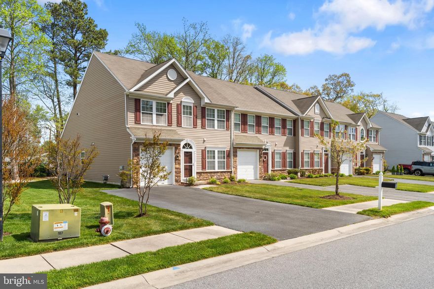 Nestled in the desirable Windhurst Manor community, this one-owner two-level end-unit townhouse offers a comfortable blend of style and everyday convenience. Built in 2009, the home features a traditional exterior paired with a warm, inviting interior complete with a mix of hardwood and carpet flooring.

The open-concept layout creates an easy flow between the living and kitchen areas, making it ideal for both relaxing and entertaining. The kitchen offers ample cabinetry and generous counter space, creating a functional and inviting area for everyday living.

The layout is thoughtfully designed with main-level living in mind, featuring a primary bedroom on the first floor complete with an en-suite bath and walk-in closet. A convenient half bath is also located on the main level for guests. Upstairs, you’ll find two additional bedrooms, a full bathroom, and a versatile loft area that can serve as a second living space, office, or guest retreat.

As an end unit, the home enjoys added outdoor space, perfect for unwinding or enjoying a quiet evening. Sidewalk-lined streets invite you to take a stroll through the neighborhood, while community amenities such as the outdoor pool and clubhouse offer great opportunities to relax and connect.

The association fee covers lawn care, snow removal, and trash service, allowing for easy, low-maintenance living. Conveniently located near parks, shopping, and dining. This home also includes an attached garage and driveway parking for added ease.

No short-term rentals are permitted, however yearly rentals are allowed. Whether you're looking for a primary residence, a vacation getaway, or an investment opportunity, this property offers flexibility to fit your needs.