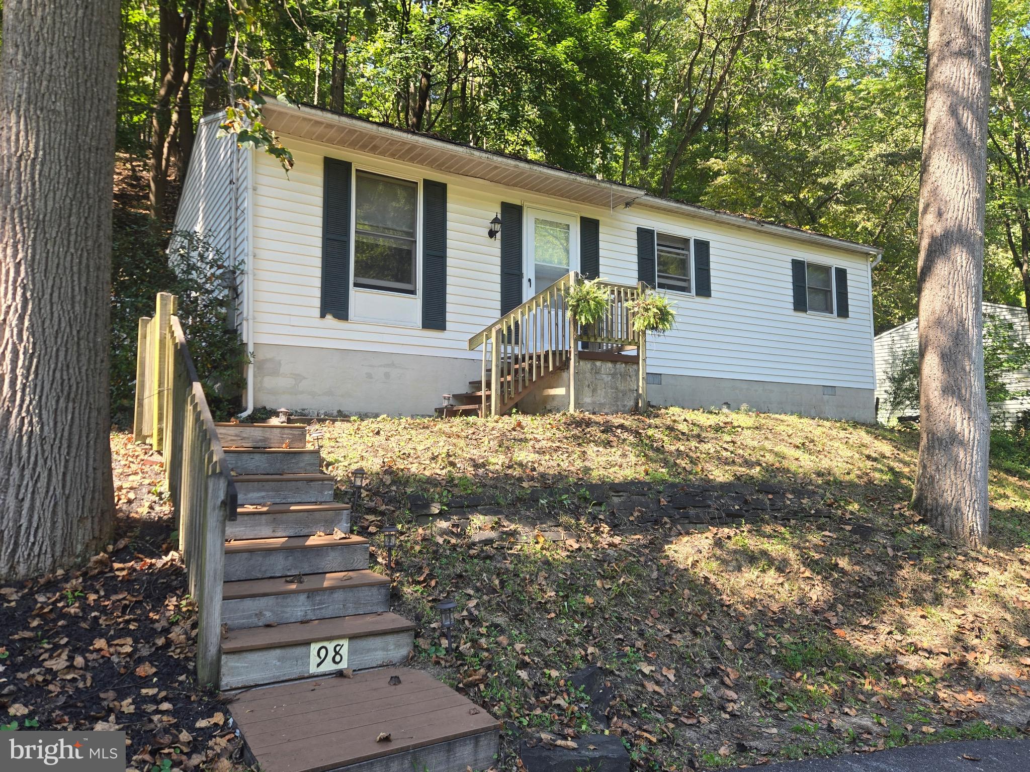 Escape to peace and privacy in this charming, freshly painted, 3-bedroom, 1-bath ranch nestled in a quiet, wooded enclave in Valley Township. Surrounded by mature trees and the soothing sounds of nature, this home offers the perfect blend of rustic charm and everyday comfort. A clean, dry basement offers plenty of room for laundry, storage and workshop.