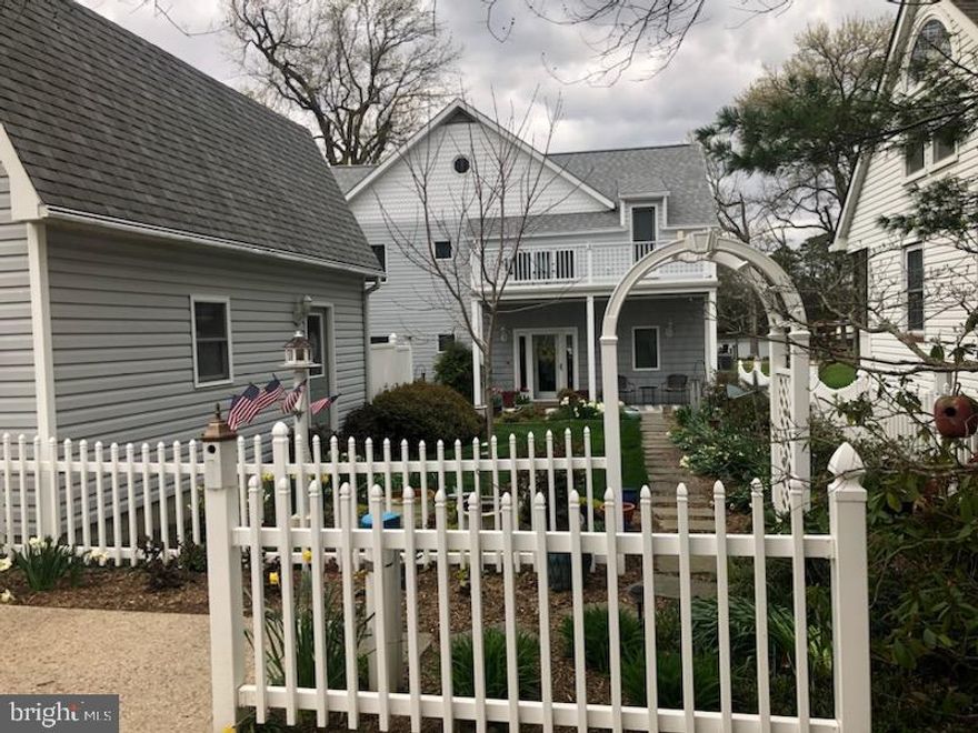 Nestled on quiet Mc Kays Cove located off Herring Creek and the Potomac River.  This four level well appointed and maintained home with many features is located in quiet Mc Kays Beach S/D.  No thru traffic.
Property features  a 5 ft. wide pier with "L" and two boat lifts.  The detached garage with loft and 2 garden sheds provide plenty of storage.  The house features a bright and nicely planned kitchen with cabinets to the  ceiling, high end appliances, granite counters and a center  island.   The main level also includes spacious living and dining area with F/P,  a 24 x24 sunroom with separate heat pump and a full bath .  Upper levels include two bedrooms and several sleeping  areas for your waterfront quests, also   2nd F/P & relaxing area.  There are 2 decks off of this level to sit and enjoy the views 
House boasts all high end appliances and equipment such as Andersen  400 Series windows and doors. Two Travis Extraoidnaire gas fireplaces with remotes and 13 KW generator
The property is nicely landscaped and lawn is manicured.  Nothing to do but relax and enjoy.