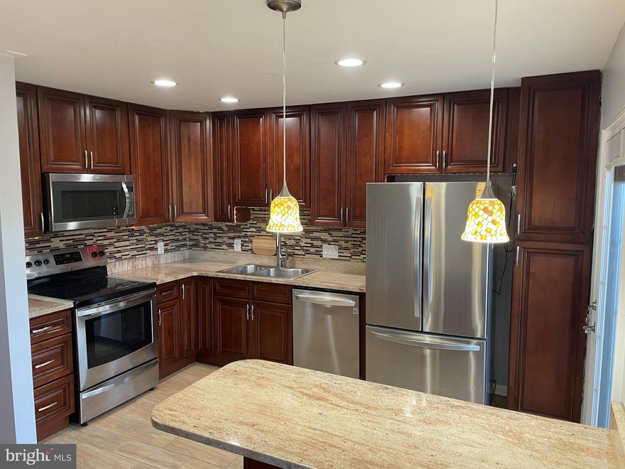 Immaculate 4BR/3.5BA townhome available 1/1/26. Hardwood floors on main & upper levels, fireplace, upgraded kitchen w/ granite countertops & stainless steel appliances. All 4 bathrooms remodeled. Upper level features 3 bedrooms; walk-out lower level includes 1 bedroom, full bath, laundry, storage & utility room. Bright home w/ lots of windows. Maintenance-free deck/patio. 2 assigned parking spaces. HOA included. Located in Little Rocky Run on a quiet cul-de-sac, close to shopping, dining & major commuter routes. No pets, no smoking. Two incomes to qualify. Long-term lease preferred.