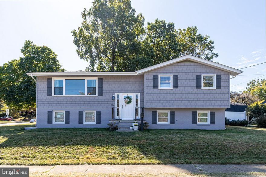 Buyers will not want to miss this sleek and modernized home located in Timonium! This home features an open floor plan, quality finishes, stunning maple wood floors, gorgeous renovated bathrooms, recessed lighting, and ample storage. The living room seamlessly flows into an entertainer's kitchen, enhanced with Quartz countertops, stainless steel appliances, wine refrigerator and a center island, creating the ideal space for gathering family and friends. Adjacent to the kitchen is the breakfast room with floor to ceiling windows, where you can enjoy your morning coffee in this sun bathed space. The master bedroom features an en suite that includes a spacious shower with clean modern finishes and a large walk in closet with built in organizing space. The fully finished lower level has a large family room drenched in natural light, laminate wood floors and stately columns for accent.  A bedroom, full bath, and  large unfinished laundry/ storage area finish off the space. The backyard features a lovely patio enclosed by a privacy fence, which ensures the homeowners can fully enjoy use of the outdoor space.