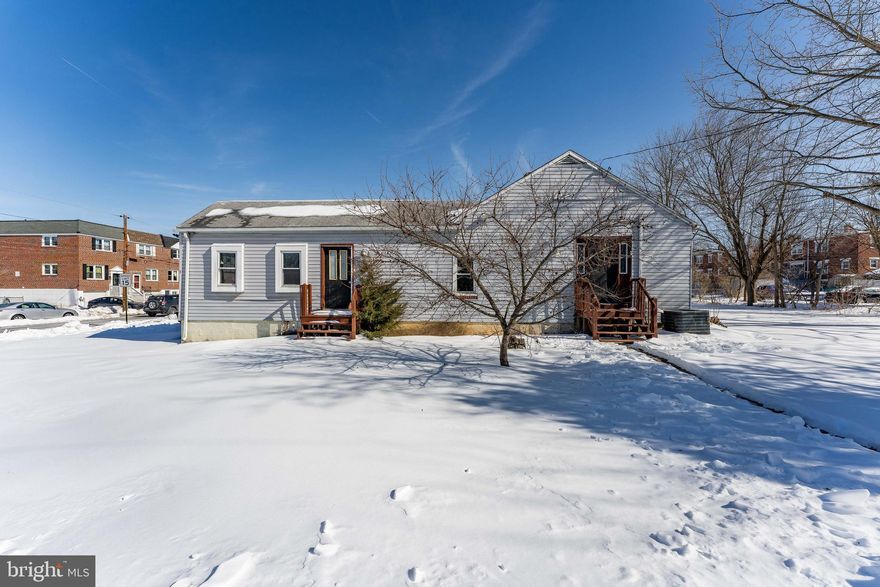 Welcome to 390 Mary Street, a 5-bedroom, 2.5-bath single-family ranch home situated on a corner lot in Downingtown. Situated across three lots zoned for twin homes, the property presents unique possibilities for future use or development. As you arrive, you’re greeted by a partially fenced yard with a wood privacy fencing, offering both space and seclusion. Inside, the foyer features tile flooring and provides access to the main living areas. To the right is a convenient powder room with tile floors and a ceiling light. To the left, a few steps down, is the living room with new carpeting. A second section of the living room includes an additional front entry, a ceiling fan, built-in shelving, and French doors that open to the fenced yard. Straight ahead from the foyer, the kitchen offers tile floors, a ceiling fan with light, double sink, walk-in pantry closet, and stone backsplash. The kitchen opens to the dining room, which features hardwood floors and a ceiling fan with light. Just off the dining room is the family room with hardwood floors, chair rail detail, a decorative ornamental corner fireplace, and a door leading to the sunroom. The sunroom includes tile floors, a wood accent wall, semi-vaulted ceilings, and a partial stone wall, providing a comfortable space to relax year-round. The primary bedroom features new carpeting, a skylight, a ceiling fan with light, and a linen closet. A full hall bathroom offers tile floors and a tub/shower combination. The second, third, and fourth bedrooms all have hardwood floors, with the second bedroom offering both a walk-in closet and a cedar walk-in closet, as well as access to the primary bedroom. A second full bathroom includes tile floors, a tub, double-sink vanity, and a skylight. The fifth bedroom features carpet flooring, a skylight, and access to the attic. The unfinished basement provides a laundry area and houses the home’s utilities, offering ample storage potential. Windows were replaced in 2017. Conveniently located near local shopping, grocery stores, restaurants, and everyday amenities, this home offers space, functionality, and a great location. Don’t miss the opportunity to make 390 Mary Street your new home.