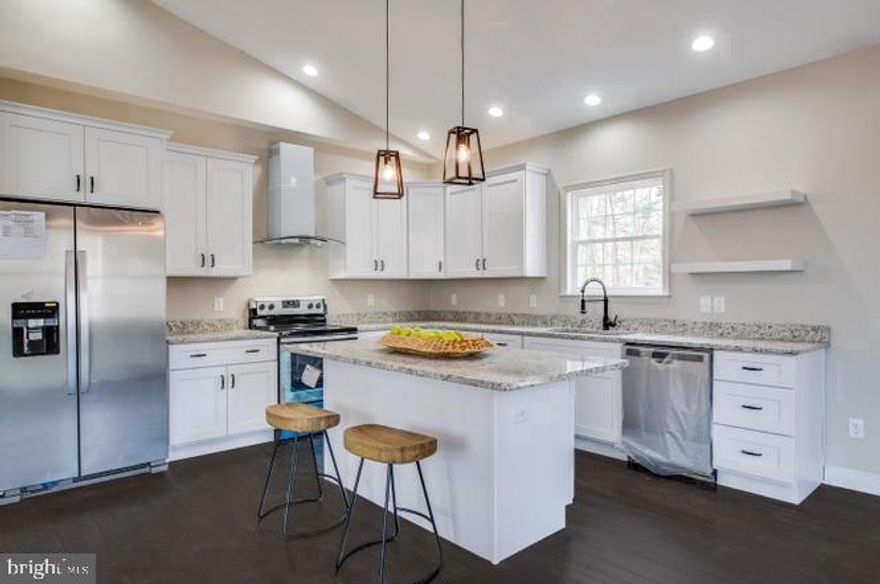 New home...READY TO MOVE IN... in Gated Lake Community! This 4 bedroom, 2.5 bath home offer hardwood throughout mail level, tiled bathrooms, granite countertops, & stainless appliances, standard! Move in just in time to enjoy all that the community has to offer...lake, beach, pool, tennis...and so much more!