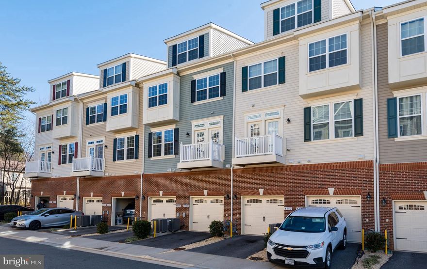 Beautiful Townhouse Style 3+ Level Condo. **1 Car Garage. ** Just 5 year New Community Lovely Home. ** No Tenant lived here before.  Gorgeous Kitchen with Granite Counter-Tops and SS Appliances.  Large Island with Granite Counters** Large Living Room with Wood Floors. ** Luxury 2 Master bedroom suits with large  Walk-in Closets. Two Spacious Tremendous Walk-in STORAGE in Every level.  Living Room to Balcony with Great Common Area. ** Close to Restaurants, Groceries, McDonald and Commuter Lots. ** You will Love it !!