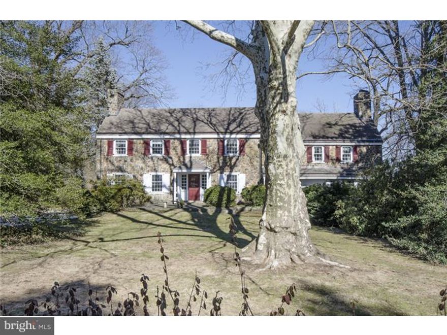 Situated on .78 of an acre on the private street of Glynwynne Road this 84 year old welcoming Stone Colonial offers a traditional Center Foyer floor plan with 6 Bedrooms, 5 full and two half baths.  Expanded over the years to accommodate the family's changing needs. There is a large ground floor new Master/ In Law Suite and a second Bedroom with full Bath. The main level encompasses a bright Family Room with fireplace and spacious formal rooms including Dining Room, Living Room and a handsome Den all highlighted with wood burning fireplaces.  The Second Level offers four Bedrooms including the original Master Suite with ensuite bath, fireplace, and views of both the rear and front yards, a fourth and fifth Bedrooms, one with fireplace and walk in closet which share a Jack & Jill Bath, and a  sixth Bedroom  with ensuite Bath, as well as an Office with an attached half Bath. Detached Garage with Unfinished Space above. With its superior "bones," strong architectural presence and ideal location this home awaits the next owners.