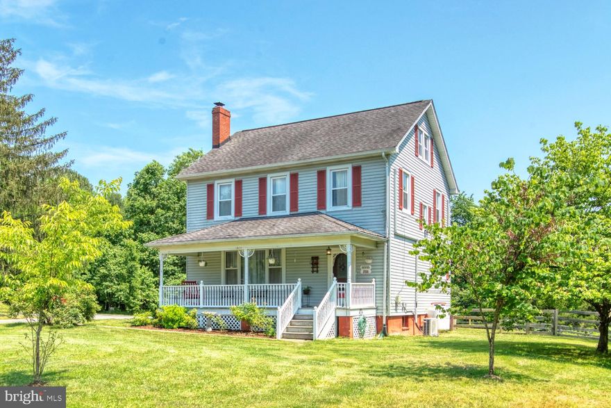 Take a step back in time in this updated 4BR 2.5FB 4 level classic Colonial with hardwood floors, period style trim, and a maintenance free covered front porch just outside of the La Plata town center.  Main level with 9ft ceilings, wood burning fireplace with a custom oak mantle, french doors between dining room and living room and open floor plan kitchen with center island cooking area.  The bedroom level also features wood floors.  On the top level (the 4th level) of the home is an unfinished area for storage or for you to finish into a large home business office area, a recreation room, more bedrooms or whatever best suits your needs.  The partially finished walk-up basement has the laundry area, a workshop area and family room.  The main level and upper level rooms have ductless mini-split air conditioning and heat pump systems with temperature control for each room the units are in.  The finished levels also have classic style propane boiler radiator heating.  The partially fenced large rear yard has a storage shed, a large deck perfect for entertaining or just relaxing and enjoying the wooded privacy.  No HOA!   As-is sale
