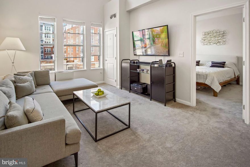 Rare Penthouse level condo with LOFT and TWO parking spaces at Halstead at the Metro!   The two -story living room offers tons of natural light and has newer carpeting (2019).  The updated kitchen offers granite countertops, new luxury vinyl flooring (2021) and newer stainless steel appliances (2019).  Unit includes washer and dryer.  The bedroom features two closets.  The bathroom has recently be updated with new floor and tub tile (2021) and well as vanity (2019). Washer and dryer also updated (2019).
The community  offers impressive amenities including a fitness center, pool, 24-7 Security, concierge,  indoor basketball, business Center and party room.  There is even an electric car charging station and private dog park! Walking distance to the Dunn Loring Metro and easy access to Rt. 66, 495, Rt 29 and 50. Unit includes TWO garage parking spaces.