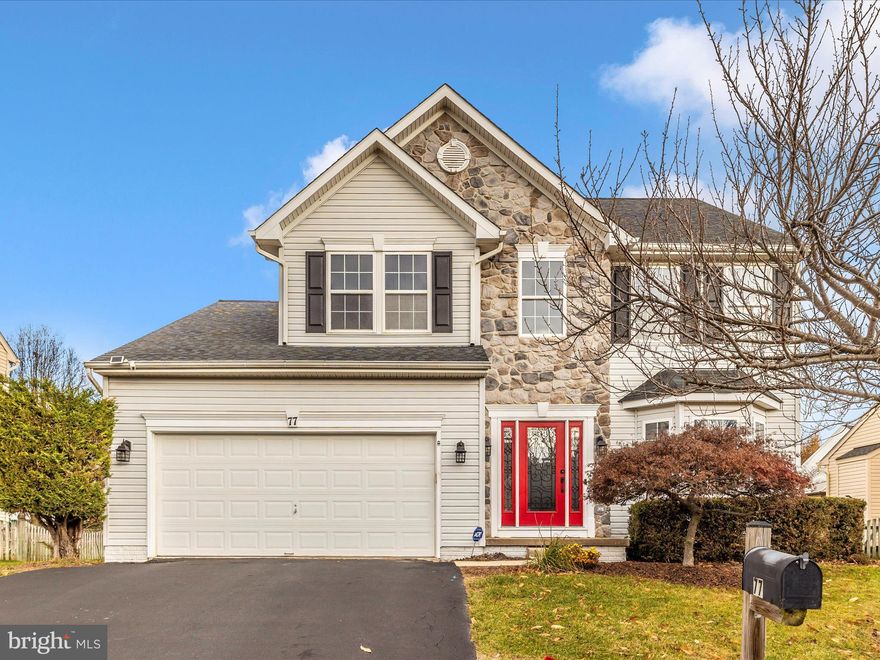 **Offer Deadline Monday 12/11/2023 at 4pm** Look no further, this is the one you've been waiting for!!! From the moment you walk through the striking red door, you're welcomed into an open and luxuriously updated 2-story foyer. New balusters grace the hardwood steps. Newer paint and updated wood flooring throughout the home. Open floor plan is accentuated by the flow of living room, to dining room, into the kitchen. Kitchen was updated in 2018 with new countertops, appliances, backsplash, and 2 tone painted cabinets. The eat-in kitchen flows into the open family room with gas fireplace. New deck 2023!! Upstairs find a gorgeous primary suite with updated ensuite bathroom. Hardwoods grace the entire upper level. Upstairs has an additional 3 bedrooms, and share a full bath. Main level laundry. Basement is fully finished, including a third full bath, open recreation space, and exercise space. Basement has walk-up stairs to back yard. This home has everything you need, and is move in ready!!!