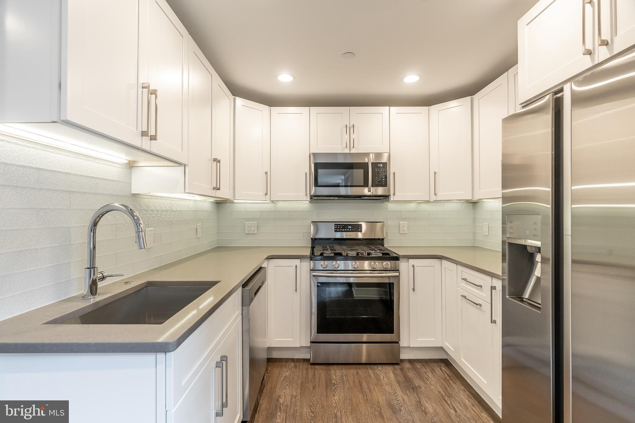 Welcome to Valletta, where style, luxury and comfort come first. This beautiful new construction condo unit includes finishes and features that will delight, from the hardwood flooring, high ceilings, recessed lighting and large windows for ample natural light. The open living and dining room floor plan accommodates any furniture arrangement and include access to a spacious patio area, as well as naturally showcasing the gourmet kitchen, complete with gorgeous counter-tops, stainless steel appliances, under cabinet lighting and beautifully tiled back-splash. The first floor also includes a lovely master suite, complete with a large closet and luxurious en-suite bathroom with custom tiled shower with frame-less glass enclosure, tiled flooring and stylish vanity. A quick trip downstairs reveals two spacious light filled bedrooms with ample closet space, a conveniently located laundry closet and hall bath with tiled shower. Found in the heart of Society Hill, Valletta is just steps away from a variety of shops, eateries and more- all of this, with a tax abatement pending? Don't wait, see it today! Parking is available for an additional $35,000"
