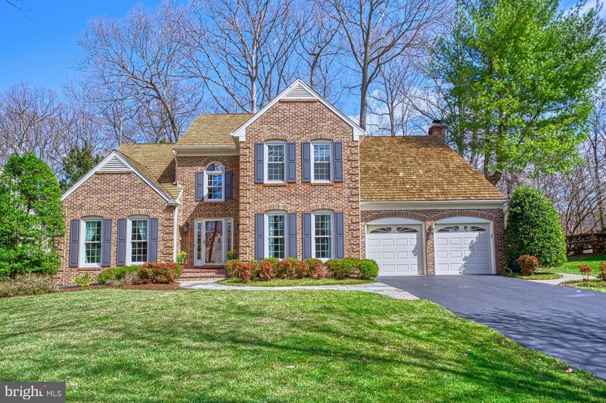 Wonderful upgraded stunning colonial in beautiful Franklin Oaks!!!  Nestled on a tranquil lot backing to parkland, this lovingly maintained home has an open floorplan that includes two-story ceilings, vaulted ceilings and lots of crown molding.   There are hardwood floors throughout the main level with built-ins, recessed lighting and newer windows.  The living room is filled with light and opens to a large dining room with a box window overlooking trees.   The gourmet kitchen has been remodeled with newer cabinetry, granite, under-cabinet lighting, glass doors and a large island with bar stool seating.   There are stainless steel GE and Whirlpool appliances including a five-burner gas cooktop, a side-by-side refrigerator with ice dispenser, and double ovens.  The kitchen overlooks the breakfast area and the terrific family room with a raised-hearth, brick, wood-burning fireplace.  There is built-in shelving on either side of the fireplace, recessed lighting and access to the large fun deck and patio in the private rear yard.    Also on this level is the versatile fifth bedroom that has access to the fourth full bath.  The bedroom currently makes a great sunny office.   The gracious entry foyer with a wooden bent staircase leads to the upper primary suite with a sumptuous remodeled bath with a deep soaking tub, a designer-tiled shower with frameless glass, and dual sinks.   WOW!!!  All four of the upstairs bedrooms have great windows, large closets, brand new carpeting and ceiling fans.   The awesome lower level has a large recreation area with a gas fireplace, built-in TV area, shelving, recessed lights and a game table area.   There is also a pool table with a ping pong conversion top and a wet bar with barstool seating.  It has a full size refrigerator and pendant lighting.   There is an exercise room / guest area with access to a newer full bath.  There is an extensive storage area, along with the high-efficiency gas furnace and the brand new gas hot water heater.   You will love the welcoming rear yard with the large deck and paver patio overlooking the treed parkland.   Your guests can be greeted via the slate sidewalk and brick front porch or there is a terrific paver sidewalk from the front around to the back.   This home has been almost completely updated throughout so that the new owners can move-in and relax!!!  Even the garage flooring has been freshly painted and the 30-year wood shake roof has about another ten years of beautiful life!   The sought-after Franklin Oaks community, with its large central pond and walking paths, is located near major employment centers like Tyson's Corner, Fair Lakes and the entire Dulles Technology corridor.   It is convenient to the Fairfax County Parkway, Route 50, I-66 and the Dulles Access Road.    Enjoy all that the nearby Reston Town Center offers!!!  The home is served by the GREAT Fairfax County schools in the Oakton High School Pyramid.