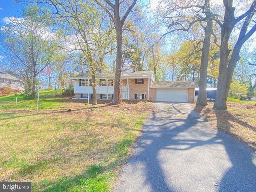 A bid has been accepted. Now Open to ALL Bidders.  Bids will be reviewed daily.  This inviting brick front split-level home sits on a generous lot, brimming with potential for your personal touch. Ideally located for easy commuting to Washington DC, Annapolis, and Joint Base Andrews, it offers the perfect blend of convenience and comfort.
Enjoy close proximity to a variety of amenities, including restaurants, shops, and a lively farmers market. Plus, it's situated within a highly coveted Blue Ribbon School District, making it an excellent choice for families.
Seize the opportunity to transform this house into your dream home!

HUD owned case # 241-920047.  UI (Uninsured) Subject to Appraisal.  LBP notice provided, EHO.  Seller makes no representations or warranties as to property condition.  HUD Homes are sold “AS-IS”. Seller may contribute up to 3% for buyer’s closing costs, upon buyer request