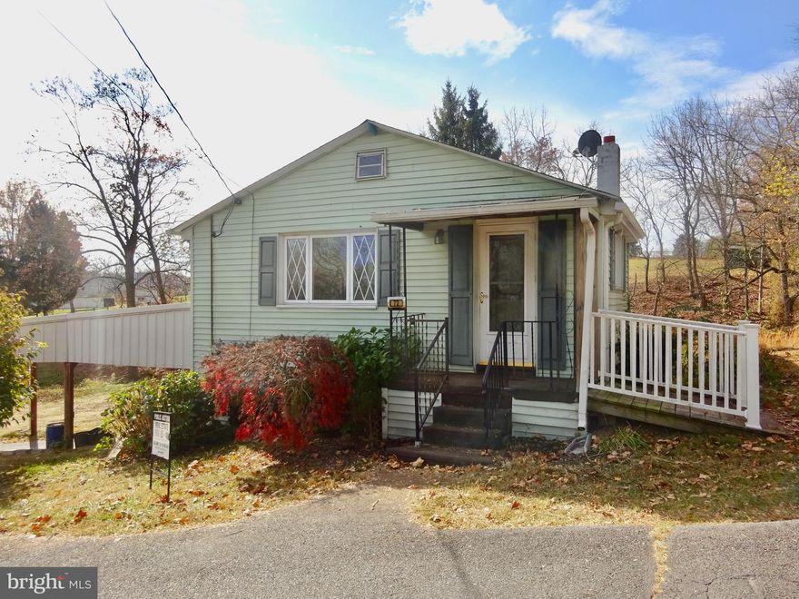 Property to be AUCTIONED!! Saturday, November 23, 2024 at 11:00 AM!!! List price is the opening bid. Potential abounds in this 1 bedroom 1 and a half bath fixer upper in Brecknock Township, Berks County. The main level consists of a 28 handle eat-in kitchen, a small living room, one bedroom with a walk-in closet and a full bath. An unfinished 15’ X 15’ addition rounds out the main level. The walkout basement boasts a utility room, laundry room, half bath, and a 22’ X 13’ workshop. The home sits on an acre lot with a bubbling creek running through it. Amenities include an attached car port, oil hot water heat, and the previous owner had a picnic area across the creek in the backyard. Property is being sold as is where is, with no contingencies. Winning bidder will pay a non-refundable down payment of $10,000 on the day of the auction, net within 30 days. A 10% buyer premium will be added to the winning bid price. Auction will be held at the property on November 23rd  at 11:00 AM.