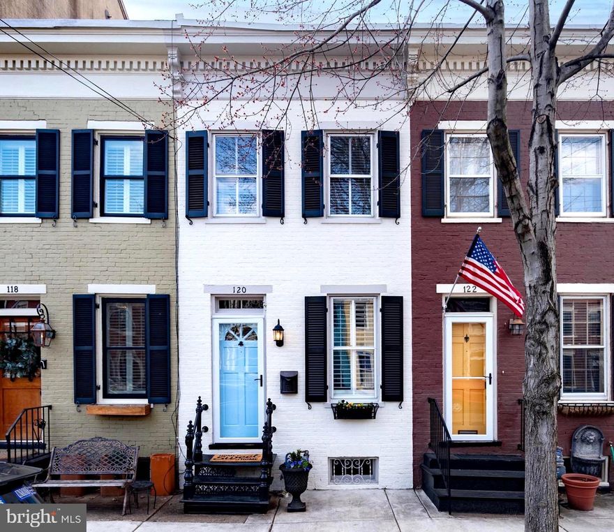 Don’t miss this perfectly located 2BR/2.5BA 1875 townhome with updates and enviable features galore, including new roof and HVAC, three fireplaces (two wood-burning and one natural gas), new and restored windows, loads of storage, your own fully fenced private patio with new cedar fence, and a just-built covered carport. Wood floors throughout, enjoy a flowing floorpan that leads you from the front sitting area with its charming built-ins and cozy fireplace, through the elegant dining room with exposed brick wall, to the well-appointed kitchen, and second living room. Gleaming open kitchen offers ample cabinet storage, stainless steel appliances, gas cooking, and sparkling honed granite countertops. Back living room with second fireplace opens to inviting private patio with low-maintenance landscaping, and sparkling string lights. Half bath on main level renovated in 2018. Full unfinished basement was waterproofed with a new sump pump in 2015, and offers a dreamy amount of storage space. Recently updated primary suite fits king-size furniture and includes third fireplace, spacious walk-in closet with Elfa organization system, a recently renovated ensuite bath with double sinks, and large spa-like walk-in shower. Second bedroom offers Murphy bed to maximize room’s flexibility.  Spacious full guest bath just updated, and includes a tub/shower combo. 

RECENT UPDATES: 2022 - House repainted and guest bath updated; 2021- New covered carport; 2021 - Cedar fence; 2021- New hardwoods on upper level; 2021 - Replaced windows, door, and storm door on the back of the house; 2020 - HVAC; 2020 - New roof; 2018 - Reno of master bathroom and half bath; 2016 - Restored the historic windows on the front of the house + new ropes and pulley; 2015 - Waterproofing system with sump pump; and 2015 - Water heater.

Located blocks from Old Town's top dining and shopping destinations, .4 miles to King Street Metro, and a short drive to DC + DCA. Don't wait to get in! Only one block to the best restaurant, wine boutique, chocolate shop, and gelato shop in town!