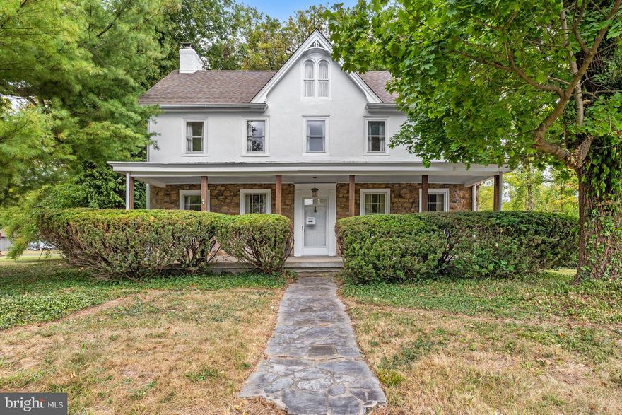 This beautifully preserved family farmhouse, built in 1870, retains all the charm and character of the past—without the usual drawbacks of owning an old home -- updated Mechanicals and Roof and Exterior! As you step through the well-maintained stone façade, you'll be walking on hand-split pine floors that gleam bright like they were just installed. The thick stone walls keep the interior cool, even on the warmest of days. Inside, you'll find a large a large eat-in kitchen, a cozy family room with a wood-burning fireplace, a grand dining room, and a formal living room perfect for hosting special occasions. The second floor offers four huge bedrooms and a full bath, while the large attic on the third floor provides ample storage space or could be finished for additional living space. On the main floor, there's a convenient half bath, laundry in the mudroom just off the kitchen, and a dry basement equipped with an efficient natural gas boiler and sump pump. The home boasts an updated 200-amp electrical panel. Enjoy the picturesque 1-acre wooded lot, offering plenty of room for outdoor play and a detached two-car garage for storage. With just a few finishing touches, you can modernize the interior to your taste. Located in the sought-after Upper Dublin School District, this home is just minutes from the Ambler train station, I-276, Temple University Ambler Campus, public parks, and much more.  Schedule your tour today!