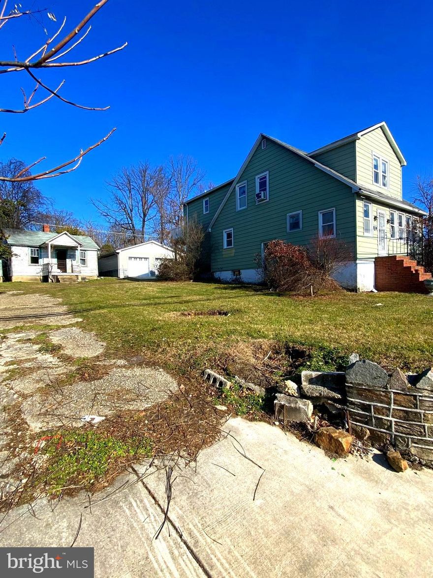 Huge Price Reduction!! Fantastic Investor or Savvy Homeowner Deal. This unique property features  2 houses and  detached garage. Prime location in sought after Parkville area. Both properties need full renovations. Property is being sold in As-Is condition, seller will make no repairs. Don't miss this opportunity!!