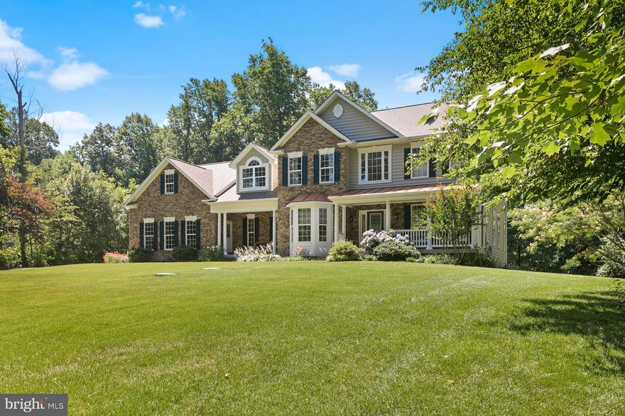 Come home to this luxurious home in a peaceful country setting on just over 2 acres in Portobello Estates!  This spacious and immaculate smart  home features beautiful upgrades, a brand new roof with owned 21st Power Solution solar panels, a whole house generator,  and HAI automated lighting system and ZON whole home audio and is completely move in ready! Beautiful landscaping, stone front and a stately porch greet you as you enter this amazing home. Open floor plan with neutral paint colors, main level office with french doors, bronzed oil fixtures and luxury lighting create a beautiful space.  Gourmet kitchen leads to sunroom, tons of natural light and beautiful view of the lush back yard and woods.  Gas fireplace for cozy family room enjoyment.  Kitchen features gorgeous neutral Silestone counter tops, stainless appliances, and tons of blonde oak cabinetry for ample kitchen storage!  This home features whole house water filters and water softener as well.  Gorgeous and spacious four bedroom layout upstairs with en suite, walk in closets and ceiling fans.  Master bedroom suite includes beautiful trayed ceiling and sitting area. Even more space to expand in the basement, so many possibilities!  Three car attached garage with additional detached garage/workshop with electric.  Paved driveway designed for three extra parking spaces facing back of lot.  Aluminum fencing and paved patio in the backyard as well.  Original owners have meticulously maintained this gorgeous country retreat....book your showing today!