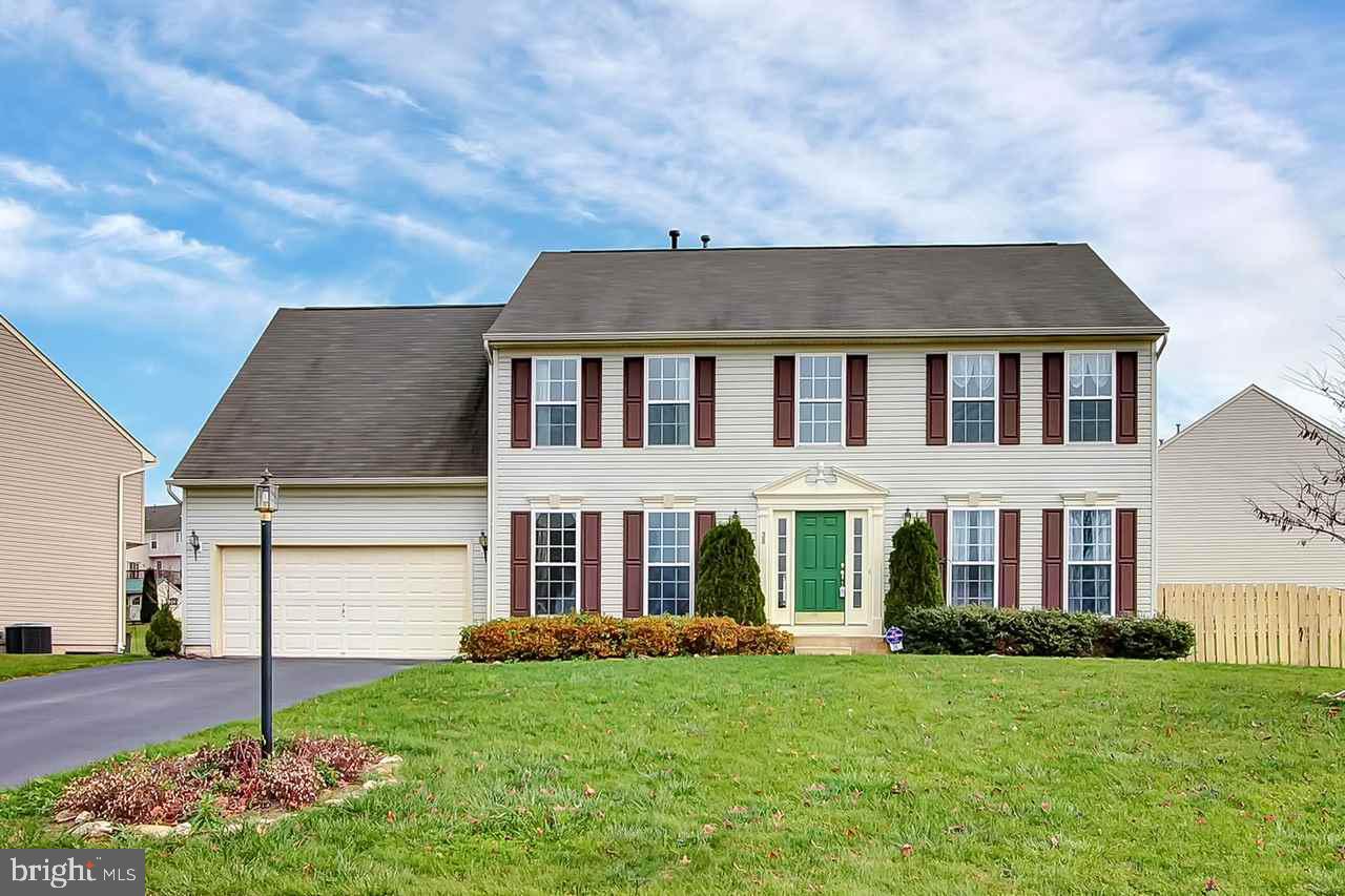 Lovely Colonial Home is Ready for its New Owners! This home features 5 oversized bedrooms, 2-1/2 baths, hardwood floors throughout first floor, large sunroom with cathedral ceiling. Fenced in yard and finished basement with large storage area. This property is conveniently located to shopping, restaurants, major arteries and the MD/PA line.