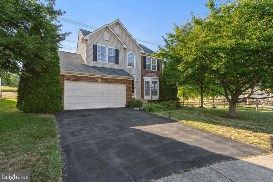 ALL OFFERS, IF ANY, TO BE SUBMITTED BY TUESDAY SEPTEMBER  19th AT 5PM. Beautiful, Well Maintained 4BR, 3.5 BA Colonial with Two Car Garage in Kirkpatrick Farms. Opening the door you will be greeted by Gleaming Newly Refinished Hardwood Floors in the Foyer, Living Room, Dining Room and Kitchen. 9 Foot Ceilings on the Main Level. Kitchen features Stainless Steel Appliances, Granite Countertops, 42" Cabinets, Island, Recessed Lights. Breakfast Area with Wood Floors and French Doors out to Rear Deck and Patio. Family Room off Kitchen with Recently New Carpet, Gas Fireplace, Transom Windows and Lots of Windows. Living Room with Hardwood Floors, Two Bay Windows and Crown Molding. Dining Room with Bay Window, Chair Rail and Crown Molding. Main Level Walk-in Laundry Room. Primary Bedroom with Ceiling Fan w/ light, Walk-in Closet and Vaulted Ceilings. . Primary Bathroom with Double Vanity, Tile Floor, Separate Glass Shower, Jacuzzi Tub w/ Jets and Tub Surround and Vaulted Ceiling. Bedroom 2 with Ceiling Fan w/ light and Double Closet. Bedroom 3 with deep closet. Bedroom 4 with Double Closet. Upper Level and Lower Level with Recently New Carpet. Lower Level features large 34x15 Rec Room with Recessed Lights and French Doors out to Wide-Welled Exit. LL Full Bath with Stand-up Shower. LL 23x15 Storage Area. Lennox HVAC 2021. Fully renovated kitchen with new granite counter tops and back splash and two addition light fixtures added 2022.  New large sink with built in cutting board 2022. New LG smart fridge 2022. Smart home with Nest thermostat, my Q garage door opener and app, Ring doorbell, and Yale numeric keypad on front door. Restained hardwood floors on main level. All updated paint colors 2022.  New washer and dryer 2022. New dishwasher 2022. Updated LED light fixtures and main Chandelier all through the house 2022. New carpeting throughout the house 2022. New window blinds 2022. Playground, gorgeous lake, and picnic area just steps away from the house.  Walking trails all around the neighborhood . Clubhouse with gym, party room, and pool walking distance. Best schools in Loudoun County. Minutes away from Dunkin Donuts, Harris Teeter,  Dulles Landing Shopping Center (Walmart, Ross, Ulta, Tjmaxx, and more),and South Riding Market Square (Home Depot, Giant, UPS, Panera, Ford's Fish Shack and many more). Please call or email co lister with all questions.