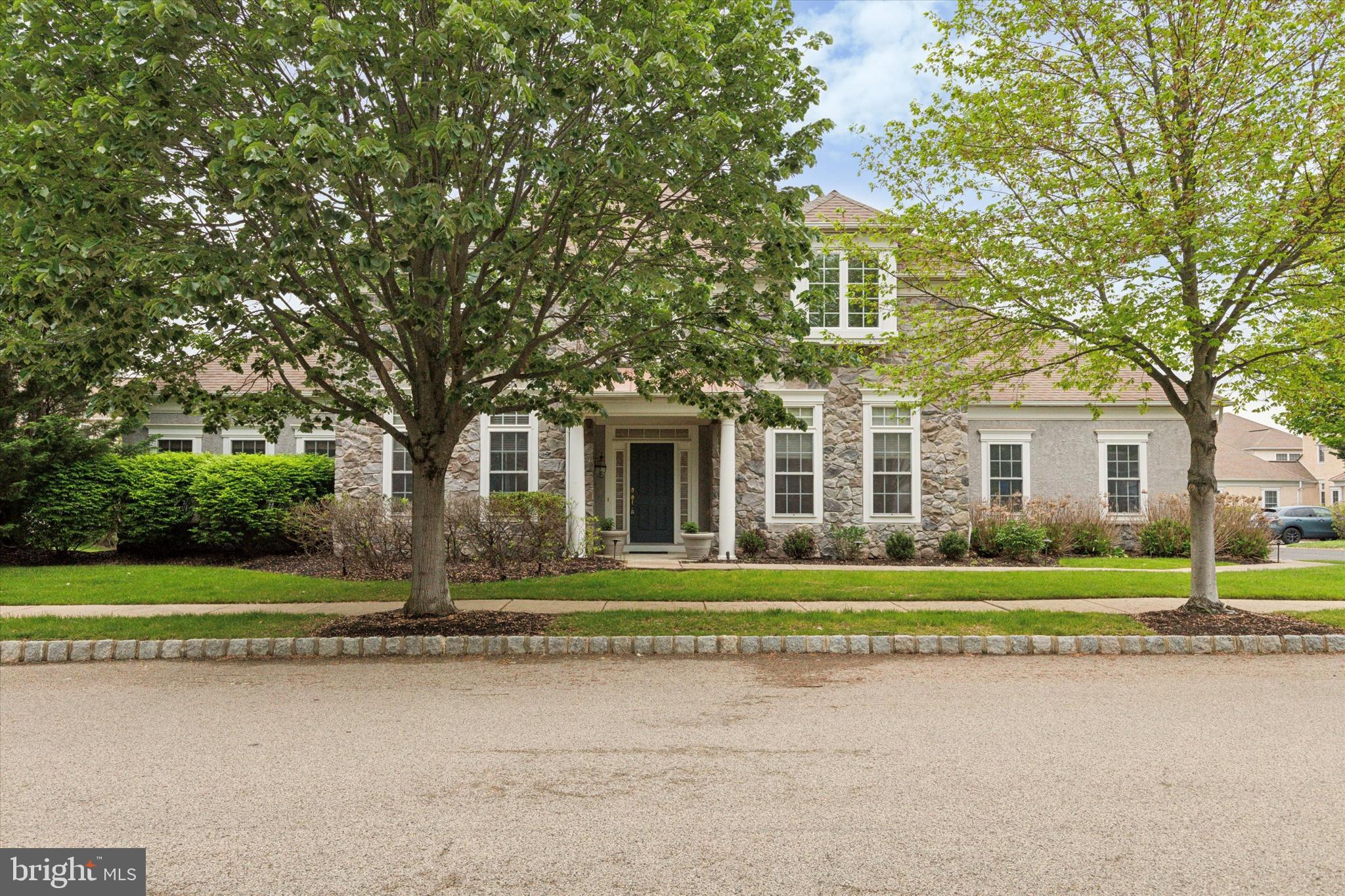 NEW PRICE - NEW FURNITURE - OPEN HOUSE JUNE 1 1pm - 3 PM Incredible chance to call the 55+ Reserve at Gwynedd community home! This stunning 3 bedroom, 2.5 bathroom modern Richland model, single manor residence is second to none. Step into a bright and airy two story foyer with beautiful hardwood floors, surrounded by the living room and dining room on either side, creating a convenient open floor plan. The kitchen is a chef’s dream, showcasing exquisite granite countertops, upscale cabinetry, upgraded gas stovetop and ovens, and a new garbage disposal and microwave. Included in the kitchen is a large seating area featuring sliding glass door access to the secluded patio with pavers and a stone wall. The oversized family room boasts an elegant stone, floor to ceiling fireplace mantel and large picture windows. Completing the first floor is a private library and a huge primary en-suite bedroom with a tray ceiling, an oversized and a walk-in closet as well as an opulent bathroom holding two upgraded granite vanities, soaking tub, and separate water closet. The second-floor provides two spacious bedrooms, each with fantastic closet space as well as a shared full bathroom. Don’t miss the large storage area that could easily be converted to an additional bedroom or office. This 3830 square foot home, complete with many storage closets, a two car garage with an outlet for a level 2 electric vehicle car charger, offers terrific entertaining space as well as cozy retreats for relaxed evenings. And as part of the Reserve, your new home provides many clubhouse amenities as well. The close by clubhouse contains an outdoor and indoor pool, hot tub, event space, fitness center and aerobics room. Be sure to take advantage of all of the clubs and activities such as discussion groups, wine tastings, excursions and cooking classes that are provided by the full time activities director.