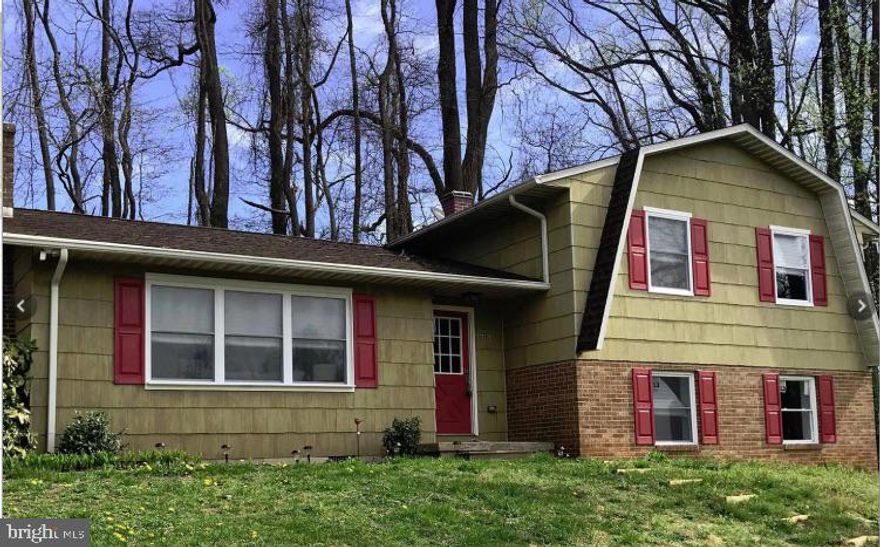 Don't miss this perfect opportunity to move into the highly desirable Forest Hill neighborhood!  This 3 bedroom, 2 bath home sits on a large 1.87 acre partially wooded lot tucked away on a quiet street with an in-ground pool! Walk in to the open floor plan updated with a gorgeous new kitchen, flooring, windows and custom touches. There's a cozy fireplace in the living room, a spacious lower level family room and newly remodeled bathrooms. Attached rear carport and circular driveway offer ample parking for multiple vehicles! Come tour this home today!