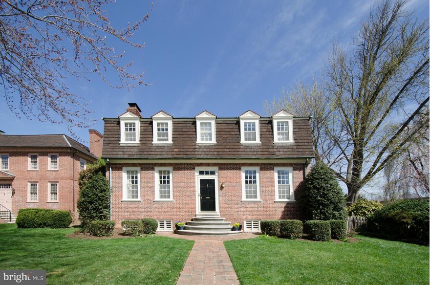 Lt-filled 5BR, 3/1BA Tidewater colonial. Gracious frmal rms w/hi ceilings, beautiful millwrk, hardwd flrs. LR w/paneled FP, bkcases, access to lg 3-season screened prch. White cntry kit w/Viking stainless range & hood & butler's pntry. 4BRs on 2nd lvl. Lg MBR w/2 double closets & MBA w/separate tub & walk-in shower. BR5 & fullBA in bsement adj to Fam Rm w/FP. Fenced rear play-yd/gardens. 2-CarGar