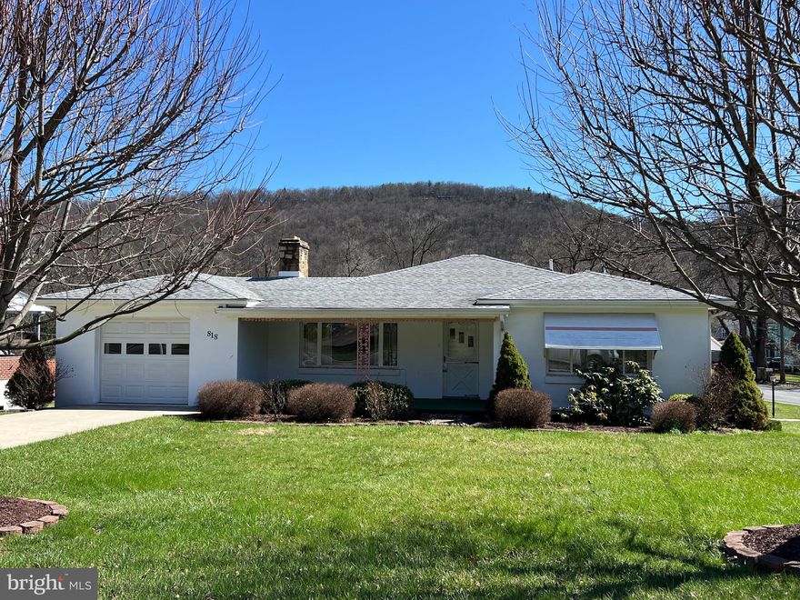 Welcome to 818 National Highway in LaVale, MD—a charming and well-maintained two-bedroom, two-bathroom rambler perfectly situated on a spacious corner lot. Backing directly to Holly Avenue Park, this property offers added privacy, scenic surroundings, and beautiful mountain views to enjoy year-round.
This home has been lovingly cared for over the years and reflects true pride of ownership. While it may benefit from modern updates, it presents an incredible opportunity for the next buyer to personalize and make it their own.
Inside, you’ll find a traditional layout with generous living space, a full basement offering abundant storage, a second kitchen, and the potential to add a third bedroom—ideal for growing needs or added value. The home also features an enclosed porch, perfect for relaxing or entertaining.
Additional highlights include an attached garage, a second driveway for extra parking, workshop space—great for hobbies or projects. With plenty of room for entertaining and everyday living, this property offers both comfort and versatility.
Whether you’re downsizing, or looking for a home with solid bones and great potential, this property is a must-see. Don’t miss the opportunity to own a home with space, views, and endless possibilities.