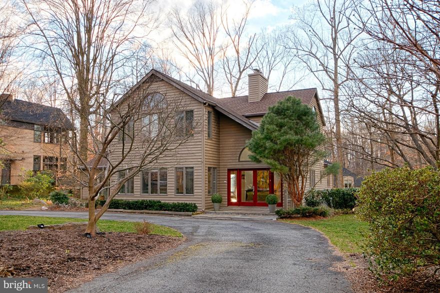 Contemporary Home tucked away in exclusive neighborhood minutes to downtown Bethesda, with Windows & French Doors Galore*Half-circular Driveway approaches this 5000+ sqft home on 1/2+ acre*Beautifully Landscaped w/generous Flat Lawn & Ornamental Trees*Updates include: Remodeled Kitchen* Remodeled Master Bath*Roof*Irrigation System*Furnace*17KW Generator connects to everything essential*