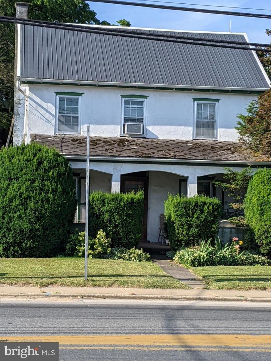 Old 2 story home that needs major updating to be considered livable.  No central heat or electric in use. Detached Garage/Barn and other storage sheds.  Zoned Commercial in the heart of the village of Intercourse with many uses possible.