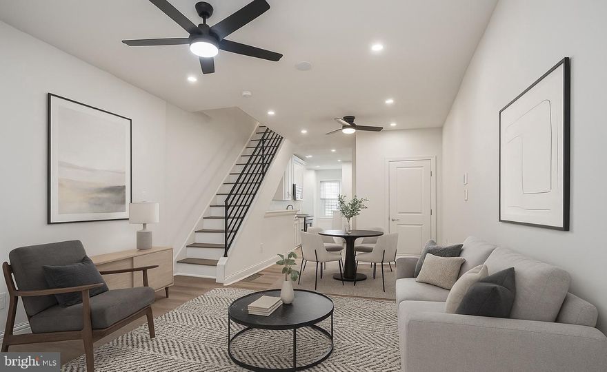 This beautifully renovated three-bedroom residence seamlessly blends timeless character with modern sophistication. A convenient first-floor half bath complements a striking exposed brick accent wall, adding warmth and architectural interest.

The designer kitchen features crisp white cabinetry accented with sleek black hardware, quartz countertops, premium stainless steel appliances, and a bold statement backsplash—perfectly suited for both everyday living and entertaining.

Step outside to a thoughtfully designed, low-maintenance outdoor space with curated greenery, offering a private retreat to enjoy throughout the seasons. Additional amenities include a hallway linen closet and a fully finished basement, providing versatile space for living, entertaining, or storage. Ideally located near public transportation for effortless access throughout the city.