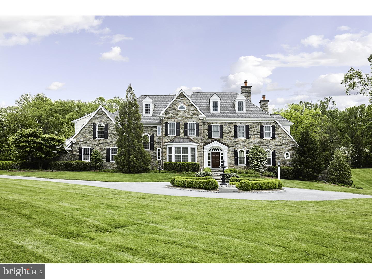 Truly exceptional Devon Estate Residence set on a glorious 2.32 acre lot on a quiet cul-de sac, complete with lovely pool and spa. Superior Pohlig construction featuring exquisite materials, stunning architectural features and timeless designs throughout. Features include breathtaking 10" ceilings on the first floor and 9" on the second floor, bright windows capturing beautiful views of the private grounds, gracious room sizes with a wonderful open flow, fabulous gourmet kitchen, beautiful oak floors, finely crafted millwork, moldings and casements, luxurious baths, a fully finished lower level with gym, media room, wet bar with wine cellar and full bathroom, attached 3 car garage and detached 2 car garage. Freshly painted neutral interior and new bedroom carpeting. Pristine move in condition. A real treasure.