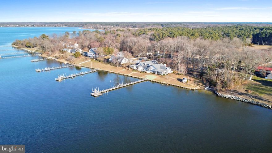 Beautiful Breton Bay Custom Retreat. A sprawling 6800+sqft one-of-a-kind gem. Over 325' of stunning, coveted, waterfrontage on Breton Bay and quick access to the Potomac River.  This expansive 5BR/5 Bath home is nestled perfectly  on a lovely 4 acre lot and accessed down its long, pretty, maple-lined lane. The original owner, Laura Mae Mako, was a renowned  interior designer and two of the bedroom suites in this home are named for her dear friends and frequent guests, Bob Hope and Helen Hayes. The original wood floors through much of this custom home were sourced in Maryland, then hand-hewn with a peg installation.  True master craftsmanship, quality construction and timeless design flow seamlessly throughout this coastal sanctuary. Custom fireplaces grace 5 of the expansive rooms. Stunning water views abound across the entire back of the home. Custom built-in cabinetry in the vaulted living room, Primary Suite and the south suites hall provide so much storage and display space. All bedroom suites have ensuite bathrooms and walk-in closets. The rooms are all grand with views of water or gardens and bedrooms are all substantial in size.  Lovely bay windows, French doors, arched halls, millwork, vaulted ceilings, beams, custom lighting and special premium touches throughout. Multiple screened porches, both water and garden-side. Private sitting areas, niches and nooks are tucked across this fabulous floor plan. Deep decks across the back of this home provide incredible waterside dining and entertaining spaces.  Enjoy the 8'wide and 100+' pier with 10,000lb boat lift and a 2nd lift for kayaks or SUP's. Relax on the sun-bathing platform or take your sunset seat for cocktail hour or sunrise seating for  Osprey and Bay life watching. Truly, every door and window has something lovely to see. Take refuge from the every day hustle and bustle to enjoy the gardens and lane, the large, screened Gazebo and the water activities, oysters, crabs and fishing just steps from this home. The  circle drive allows for fantastic parking for friends and family. The brick-paved port cochere provides ample covered parking. The large detached shed stores all your lawn and garden gear. Separate exterior stairs lead to the 2nd story private apartment over the port cochere. This cozy 1BR/1BA apartment with kitchenette is wonderful for over-flow guests or a private  office or studio. The basement has significant extra storage too. This home just exceeds expectations as soon as you open the front door. Just a short 10 minute drive (or quick boat cruise) from Historic Leonardtown and it's charming restaurants, shops and events. Close to all area shopping and schools. Only 1.5  hours from DC/NOVA. Shown by Appointment only to pre-qualified buyers.  Please Do not walk property without an agent.  Occupied Home.