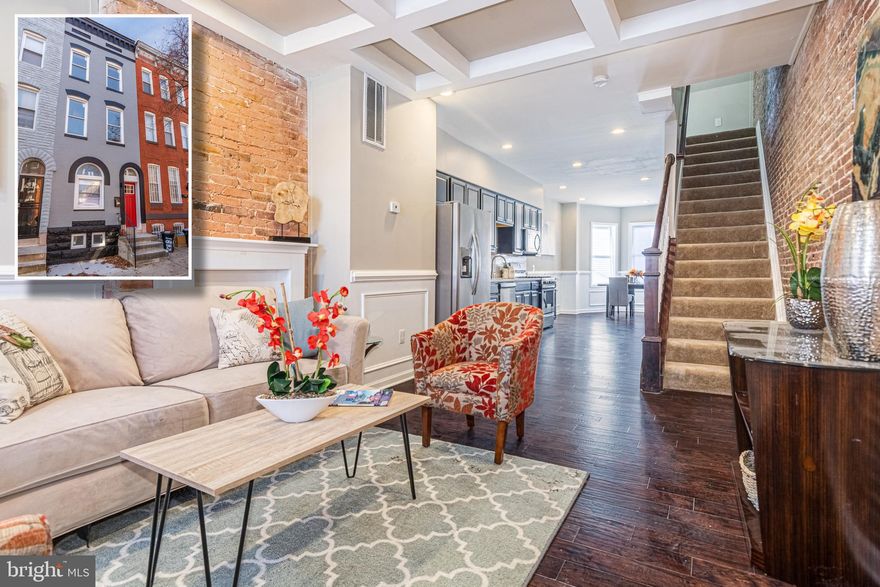 EXPANSIVE NEW RENOVATION WITH 4 FINISHED LEVELS AND 2 CAR PARKING!  Move right into this newly renovated home featuring wood floors, wainscoting, and exposed brick throughout the main level, an inviting living room with coffered ceilings, gourmet kitchen with granite counters, ss appliances, & tile backsplash, a separate dining nook, main level half bath, upper levels with 4 generously sized bedrooms, 2 full baths, and desirable bedroom level laundry, a fully finished basement with rooms that could be enclosed to make additional bedrooms and a 3rd full bath, and 2 car fenced in parking!  Located close to MICA, UMMC, and downtown Baltimore!