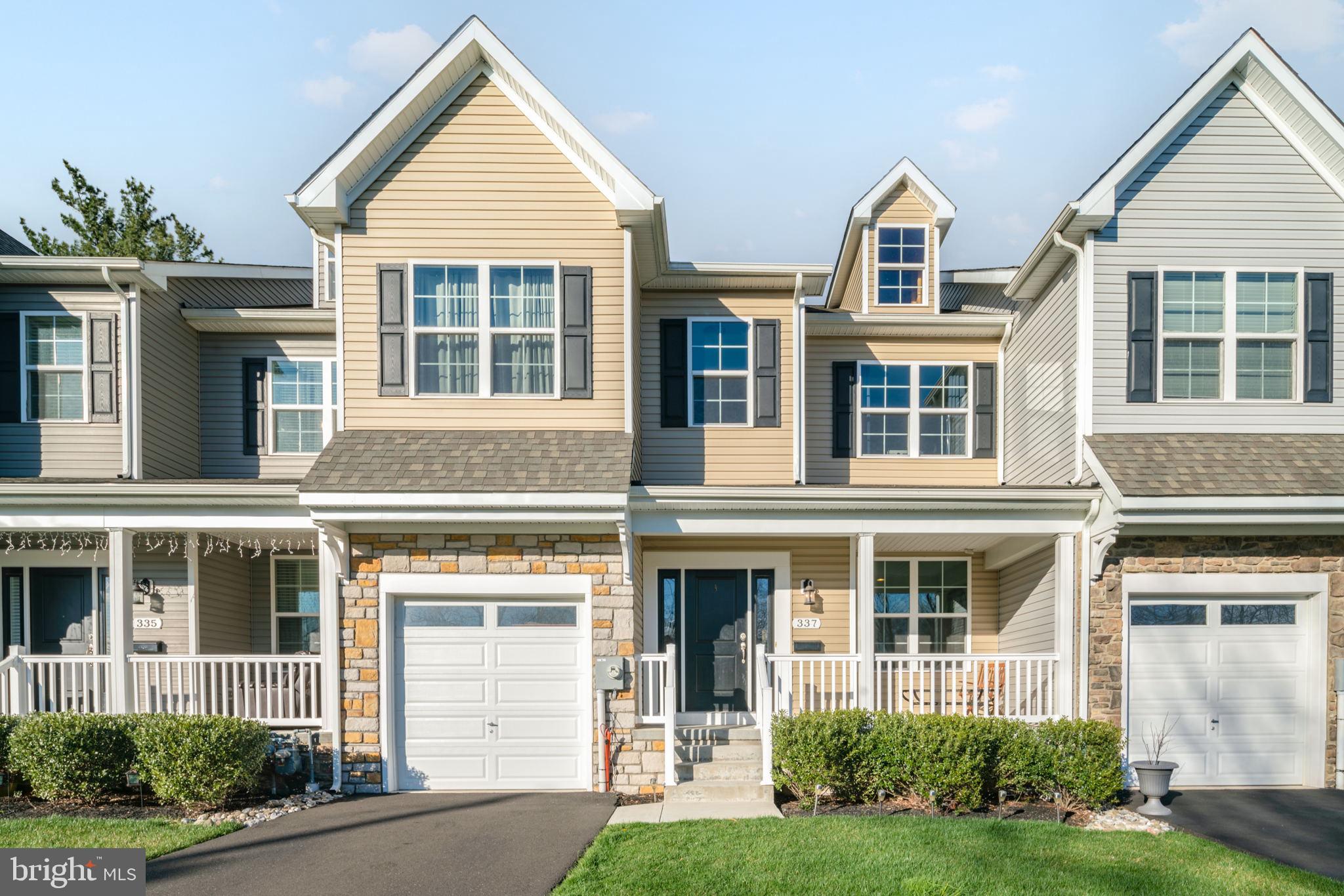 Proudly presenting this gorgeous 3 Bedroom 2.5 Bath townhome with finished basement and garage in the Centennial school district. Upon arrival you will be struck by the neutral tones of the stone facade, wonderful curb appeal and quaint front covered porch. Once entering you will be greeted by open concept floor plan, hardwood flooring and airy ceiling height. You will enter into the center hallway off the formal living room. You will continue to the focal point which is the gourmet kitchen with an abundance of wood cabinets, granite counters, peninsula with seating, stainless steel appliances, designer glass subway block backsplash and pantry closet for all of your cooking supplies. Flanking the kitchen is the family room with the cathedral ceilings and tons of windows providing an abundance of natural lighting. The is also a modest sized dining room is ideal for those special occasions and family functions. You will appreciate the slider that allows for access to the private rear deck for those times to relax and enjoy the fresh air. Rounding off the 1st floor is the powder room. Now let's go upstairs to the primary bedroom with trayed ceiling, recessed lighting, vast walk-in closet and en suite bathroom. The large primary bathroom provides a stall shower surrounded by marble subway tile, ceramic planked floors and designer double bowl sink. The 2 additional bedrooms are generous in size with plenty of closet space. The hall bathroom has a shower tub combination with ceramic floors. The 2nd floor also has the laundry room for added convenience. You will enjoy the huge finished basement for a secondary are to recreate with plush carpeting and recessed lighting. There is also an unfinished area for all of your storage needs. You will also appreciate the attached garage which provides inside access to the home. The home is 5 years new!! So you have newer gas furnace, central air, roof, energy efficient windows and siding. Home is conveniently located to major shopping and roads. Make your appointment today!! This home will not last!!