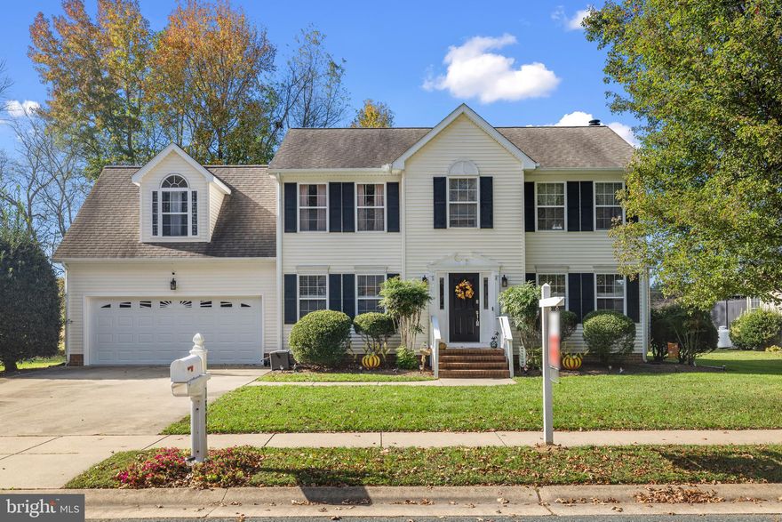 Beautiful four-bedroom colonial located in the neighborhood of Papermill Crossing.  This home has been well maintained with a fresh coat of paint and gleaming hardwood floors.  The main level boasts a formal dining and office or living room.   The  kitchen  has a  breakfast area, large pantry  and  opens into the  family room with fireplace flanked by built in bookcases.   Upstairs the spacious  primary bedroom has a  large walk in closet and spa like bathroom.  3 more bedrooms and laundry room complete the 2nd level where  the fourth bedroom  or FROG (front room over the garage) can be turned into a  rec room/bonus room.  The  property is situated on a beautifully landscaped lot where you can relax on your 2 tiered deck and enjoy unmatched views.  Location is only minutes to Easton, Oxford, shopping and restaurants.