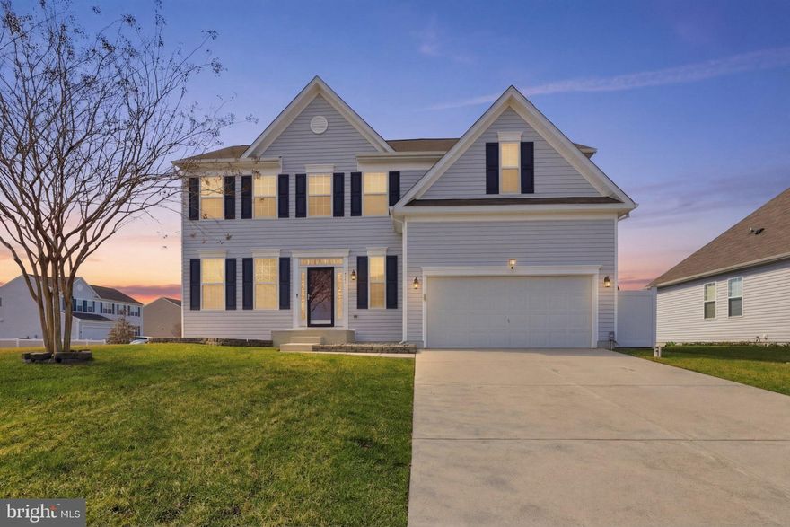 Nestled in the prestigious Chestnut Ridge community, this exquisite Colonial-style residence, built in 2015, offers a harmonious blend of luxury and comfort. With a generous 0.28-acre corner lot, the property boasts beautifully landscaped grounds that enhance its curb appeal and provide a serene outdoor retreat on the concrete patio. Step inside to discover an inviting interior that exudes warmth and sophistication. The open floor plan seamlessly connects the gourmet kitchen, featuring a spacious island, butler's pantry, and high-end appliances, including an ENERGY STAR dishwasher and built-in microwave. Elegant recessed lighting and a combination of carpet, vinyl, and tile flooring create a welcoming ambiance throughout the home. This residence offers four well-appointed bedrooms, including a luxurious primary suite complete with a walk-in closet and a spa-like primary bath featuring both a walk-in shower and double sink. Each bathroom is thoughtfully designed, showcasing modern fixtures and finishes that elevate everyday living. The home also features a second kitchen, ideal for culinary enthusiasts or those who enjoy hosting. A formal dining room and a combination dining/living area provide ample space for entertaining guests, while the curved staircase adds a touch of architectural elegance. The partially finished basement offers additional living space, complete with a drainage system and heating, providing endless possibilities for recreation or relaxation. Outside, the community amenities include a fenced, in-ground pool, playground, tennis and basketball area. perfect for summer enjoyment. The attached garage accommodates two vehicles, with additional driveway space for guests. Located in a vibrant neighborhood, this property is not just a home; it's a lifestyle. Enjoy the convenience of nearby recreational facilities and the tranquility of a well-maintained community. Experience the perfect blend of luxury, comfort, and modern living in this exceptional Chestnut Ridge residence.