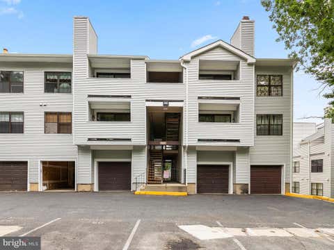 Photo of 1605 Carriage House Terrace #1605-F, SILVER SPRING, MD 20904 (MLS # MDMC2251478)