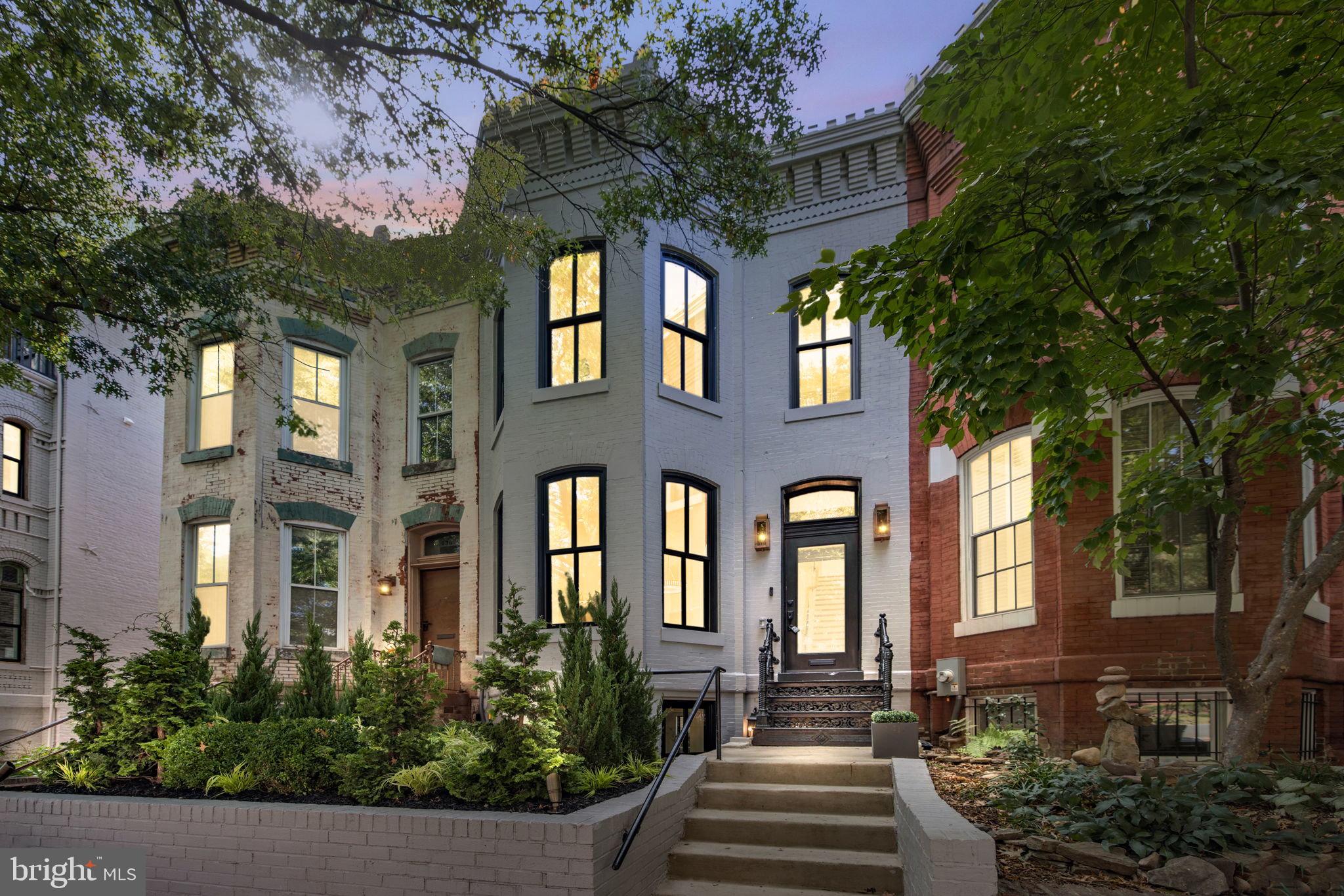 OPEN HOUSE SUNDAY, 12/3 from 12-2PM! This full renovation by the team at Lot Squared Development will take your breath away. Four levels of perfection, including a stunning sky deck. The location is hard to beat. Some of the best restaurants, shopping, and fitness in DC are all just a few blocks away from this gorgeous home. Nestled in the heart of the East Dupont Circle neighborhood, this residence stands as a testament to perfection in architectural rebirth. With four bedrooms and three and a half bathrooms spread across three magnificent stories, this abode offers an expansive canvas of 3,141 square feet of living space. The lower level presents versatile possibilities, serving as a gracious guest suite or a lucrative short-term rental opportunity. As you step inside, be greeted by the grandeur of soaring ceilings and the seamless harmony of an open-concept living, dining, and gourmet kitchen area. A splendid sunroom at the rear of the main floor, where the world outside is invited in with grace. The primary suite, a sanctuary of tranquility, boasts ceilings nearly 11 feet high and a walk-in closet meticulously curated by California Closets. The primary bathroom, adorned with a Waterworks double vanity and a spacious walk-in shower, radiates opulence. Two additional bedrooms await, each a welcoming haven for family or guests. A thoughtfully designed laundry room features custom cabinetry, exemplifying the commitment to refinement throughout. Step outdoors, and you'll discover not one, but two, enchanting outdoor retreats. Ascend to the newly constructed roof deck and be enchanted by the panoramic evening skyline views. This deck is a masterpiece tailored for grand gatherings, complete with a sophisticated lighting arrangement, electric outlets, and a natural gas connection for your grill. A rear garden just off the sunroom offers a perfect oasis for relaxation after a long day. Every facet of this residence bears the mark of Lot Squared Development's unwavering dedication to excellence. From White Oak Hardwood floors to the timeless elegance of Carrera Marble, the exquisite Marble Mosaic Tile, the designer lighting, custom trim, and crown molding, and finally, the superior luxury appliances by Viking and premium Waterworks fixtures throughout the home—no detail has been spared. For a comprehensive list of features, please consult the attached document. The developers offer to cover one year of leased parking at The Metropole Parking Garage nearby. And recognizing the city's burgeoning cycling culture, the listing agents extend a unique welcome, gifting the new owners a state-of-the-art electric bike. In a world where traffic congestion looms large, the freedom of biking through DC's streets remains an ever-popular and environmentally conscious mode of transport. The location in the city is nearly perfect. Just a few blocks to Whole Foods and Trader Joe's. The 14th Street Corridor is only a block away and offers some of the finest dining in Washington, DC.