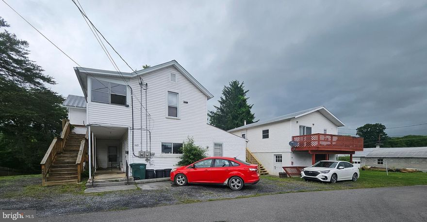 Don’t miss this Investment Opportunity consisting of a 2-story house with a 2 BR 1 BA apartment on each level, and a detached garage with a 2 BR 1 BA apartment above located 1/2 block from the State Police Baracks.  All units have private entrances and are separately metered for electricity.  All units are currently rented and the tenants in place are good reliable paying tenants that have taken good care of the units. Combined rent for all 3 units is $2,400 per month.  Security Deposits and Leases will be conveyed at closing.  Seller would appreciate allowing the current tenants to remain for at least a year after the purchase but this is a request and not a requirement of the sale.  The property has had many upgrades and you can’t judge what’s inside from the street.  In the house both apartments have had new Kitchens with quartz countertops and Maple cabinets installed, new vinyl floors, some new windows, all relatively new appliances including washer/dryers, ceiling fans and window A/C units convey.  Downstairs apartment has a large Laundry/Mudroom 12x13 and an 8 x 35 covered front porch.  Upstairs apartment has hardwood floors under carpet.  House can easily be converted back to a single-family home as the existing interior staircase still exists and is walled off at the top.   The garage apartment has all new windows and storm door, new vinyl in kitchen and bath, it has a street facing large deck off the living room with a sliding glass door, and a new entry stairs and deck were just installed in June and rent includes use of the garage.   cost 24 hr. notice to show is required, please contact the listing agent.