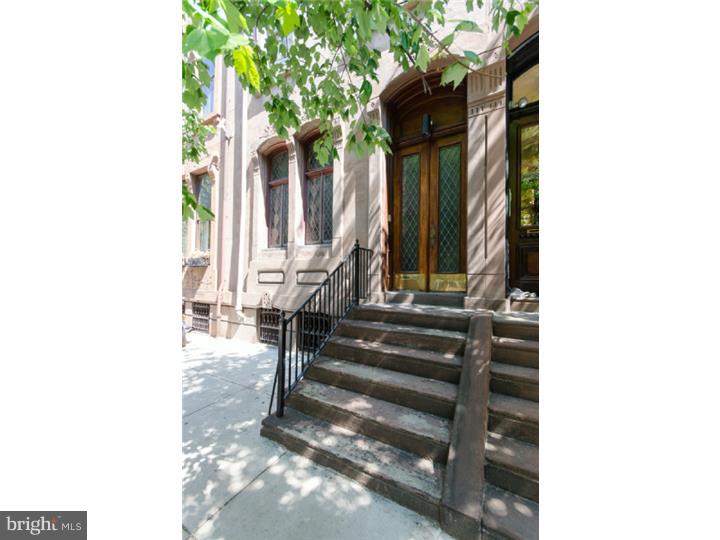 Beautiful Restored/Renovated 1850s 6+ bedroom home, large den/library with built-in bookshelves and bay window, 3 full + 2 half baths, 5-zone radiator hot water heat, 3-zone central air, in prime RITTENHOUSE SQUARE location. 1st Floor: LR with exquisite quarter-sawn oak wainscoting and paneling, carved stone decorative mantle, leaded glass windows, oak floors and dramatic high coffered ceilings; Dining room with beautiful harlequin leaded glass windows and oak floors; newer eat-in kitchen with custom cabinets to ceiling, Stainless steel GE Profile appliances + subzero refrigerator/freezer, black matte granite countertops, tile floors and side deck with room for grill; grand carved wood central stair with leaded-glass windows on landings. 2nd Floor: South-facing MASTER SUITE with custom closet/dressing area, armoire in Bedroom, North-facing DEN/LIBRARY with custom cabinetry with media center, very large separate laundry room, great storage. 3rd Floor: 2 large Bedrooms, each with sitting room/study, new hall bath. 4th Floor: North-facing office with skyline view and built-in desk, 3 additional rooms, 2 used as Bedrooms, vintage hall bath with claw-foot tub. Ground Level: Gym area with Pergo floors, replacement windows, Powder room plumbed for shower, other area plumbed for kitchen.