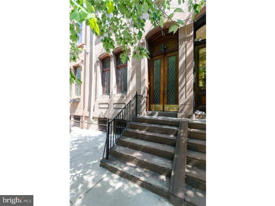 Beautiful Restored/Renovated 1850s 6+ bedroom home, large den/library with built-in bookshelves and bay window, 3 full + 2 half baths, 5-zone radiator hot water heat, 3-zone central air, in prime RITTENHOUSE SQUARE location. 1st Floor: LR with exquisite quarter-sawn oak wainscoting and paneling, carved stone decorative mantle, leaded glass windows, oak floors and dramatic high coffered ceilings; Dining room with beautiful harlequin leaded glass windows and oak floors; newer eat-in kitchen with custom cabinets to ceiling, Stainless steel GE Profile appliances + subzero refrigerator/freezer, black matte granite countertops, tile floors and side deck with room for grill; grand carved wood central stair with leaded-glass windows on landings. 2nd Floor: South-facing MASTER SUITE with custom closet/dressing area, armoire in Bedroom, North-facing DEN/LIBRARY with custom cabinetry with media center, very large separate laundry room, great storage. 3rd Floor: 2 large Bedrooms, each with sitting room/study, new hall bath. 4th Floor: North-facing office with skyline view and built-in desk, 3 additional rooms, 2 used as Bedrooms, vintage hall bath with claw-foot tub. Ground Level: Gym area with Pergo floors, replacement windows, Powder room plumbed for shower, other area plumbed for kitchen.