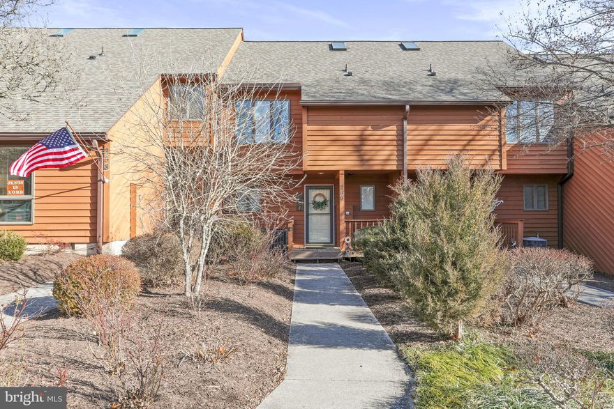 Wow! This beautifully maintained, turn-key home offers an extensive list of recent updates throughout—truly move-in ready with only your personal essentials needed. Enjoy LVP flooring, granite kitchen countertops, stainless steel appliances, updated bathrooms with refreshed vanities and fixtures, updated lighting and ceiling fans, and a newer hot water heater—plus many additional improvements.

The open floor plan features a combined living and dining area with a wood-burning fireplace and sliding glass doors leading to the first-floor deck and outdoor storage closet. The upper level includes a spacious primary suite with vaulted ceilings, a walk-in closet plus an additional closet, and an attached bath with skylight, separate shower with glass doors, and access to a private deck. A guest bedroom with vaulted ceilings, two closets (including a walk-in), and a private full bath offers excellent flexibility. A side-by-side washer and dryer are conveniently located in the second-level hall closet.

Major mechanical updates include replacement of both the interior and exterior heat pump units in October 2024, providing efficient heating and cooling and added peace of mind.

Ideally situated with scenic views of the 18th fairway of the Stony Lick Mid-Length Golf Course, this townhome combines comfort and location. Within walking distance to the Clubhouse Grill, Pro Shop, driving range, and outdoor pool, it’s perfectly positioned to enjoy the community amenities.