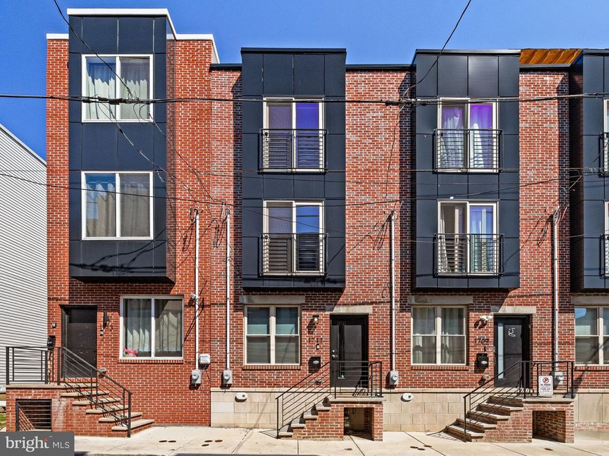 Welcome to one of the best blocks in Francisville! Located on a quiet side-street and just a short walk to Temple Main Campus, neighborhood bars and cafes, transportation and all center city has to offer.This home has tremendous value and has 8 years left on the FULL tax abatement - built in 2022.  Featuring beautiful stained oak hardwood flooring, spacious living and dining areas, 9 foot ceilings and a chef’s kitchen and two outdoor entertaining spaces. The first floor is filled with natural light and, ample living and dining, access to the private rear patio ideal for grilling and parties. The large and fully finished basement contains a full bathroom, additional living area large enough for a TV viewing room, study room or flex space for anything you can imagine. Up on the 2nd floor you will find laundry, a full bathroom and 2 bedrooms, custom closets. Located on the 3rd floor is your new primary suite containing a spa-bathroom, soaking tub, walk in shower and a large double vanity. Just outside the door you can access the top roof-deck offering additional entertaining and great views! This is a truly turn-key, worry-free home complete with custom california closet systems, roller-blinds and 8-years of time remaining on the tax abatement. Schedule a private tour or stop by the upcoming open house!