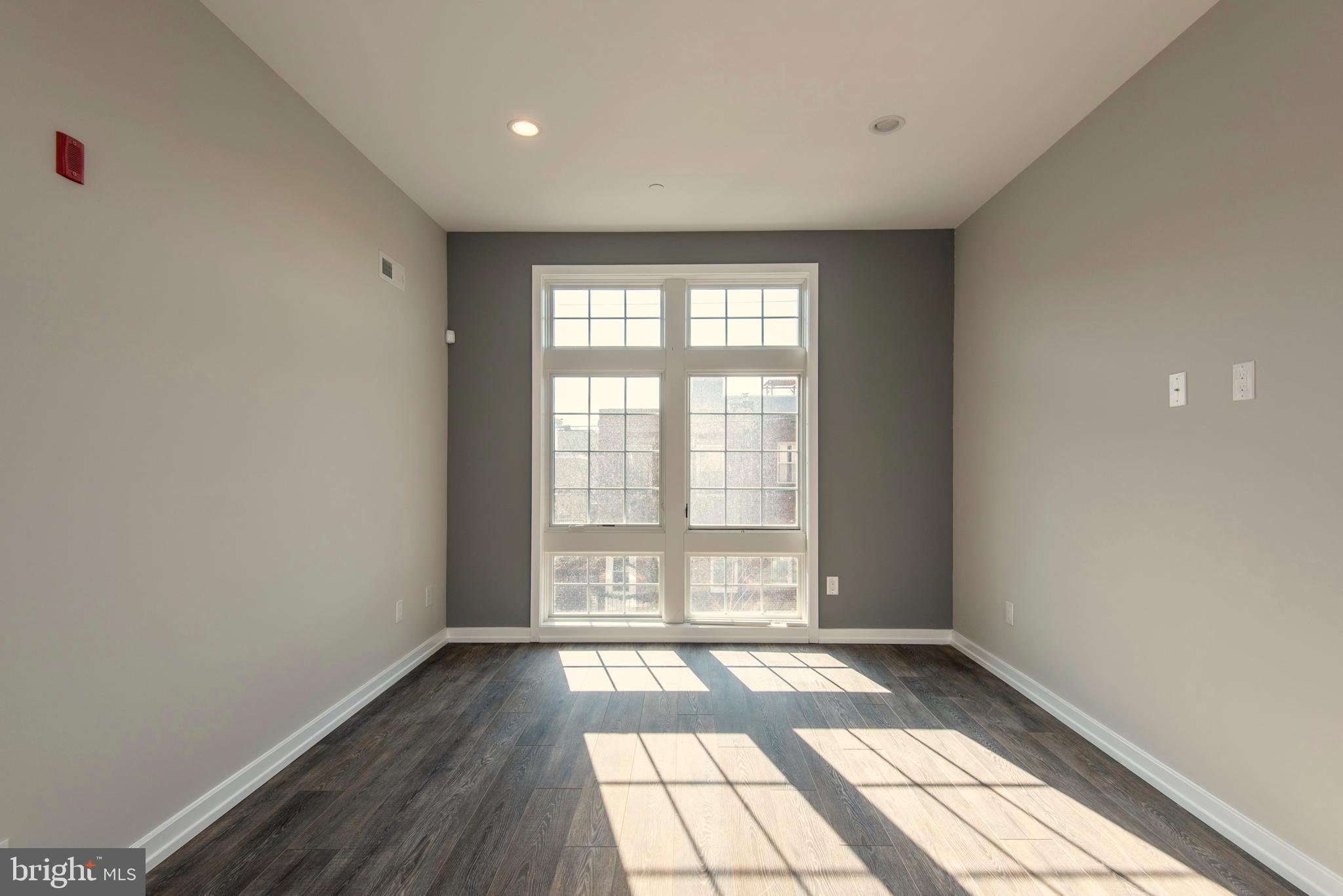 Nestled in the heart of Passyunk Square, The Exile Building is home to 23 new construction, luxury rental units, featuring top-of-the-line finishes throughout. This 1BR apartment has hardwood floors, stainless steel appliances, quartz counters, walk-in closets with custom-built shelving, custom tile-work in the frameless glass-enclosed showers, washer/dryer, recessed lighting, high ceilings with built-in speakers, Nest thermostats, video intercoms, and tons of natural light. In addition to everything we've already mentioned, the building offers a package delivery room, meeting/lounge space, and bike racks, as well as an ideal location across from Columbus Square and close to tons of shops and restaurants on Passyunk Ave.