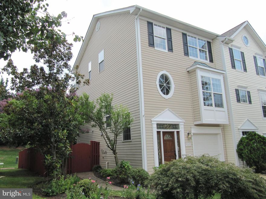 Welcome HOME! This bright and beautiful END townhouse, with 3 bedrooms & 2.5 baths is newly renovated in the desirable Wellington/Cloverhill community.  Completely painted throughout with new floors installed on the upper level.  This house stands above the rest with its 3 level extension in the back, providing more room on all levels.  The home has a sun-filled open floorplan, perfect for modern living. The main level features a spacious living area with beautiful hardwood flooring, creating a warm and inviting atmosphere. The tiled kitchen is roomy with stainless steel appliances, ample cabinetry, and a charming breakfast area. Step through the sliding glass door to access the rear deck, where you can enjoy outdoor relaxation and entertaining. Upstairs, you'll find three bedrooms, each providing a cozy retreat. The light-filled primary bedroom features a vaulted ceiling, adding an airy feel to the space, and offers a generously sized walk-in closet and a full bathroom with a separate tub and shower. Another full bathrooms on this level provides convenience and comfort for the other two bedrooms on this level. Take advantage of the excellent community amenities such as playground, tennis courts, pool, recreation facilities and more. With its welcoming ambiance and prime location, this townhome presents an excellent opportunity for comfortable living. The home has plenty of parking with a one car garage with 1 space in driveway and 1 additional parking permit. This property is conveniently located near major transportation routes and VRE, making your daily commute a breeze. Lots of Shops, restaurants, entertainment and much more.