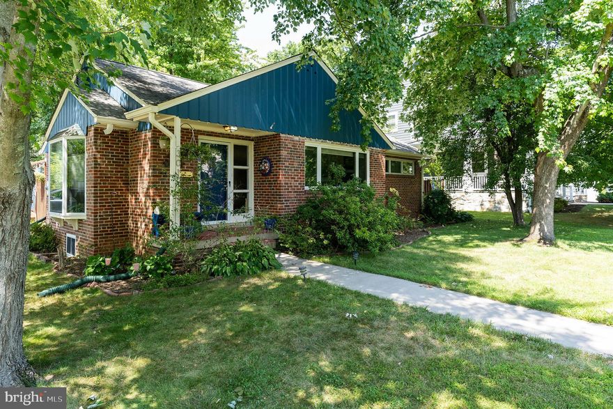 Lovely, sunny 2-level brick rambler on a large corner lot in Falls Church City. Walk to metro!  Renovated kitchen w/natural gas cooking. 3 main level bedrooms.  Fireplace, wood floors throughout. Finished lower level includes den/study/guest bedroom and spacious recreation room.  Laundry room and storage area w/work bench. Large back deck for entertaining. Fenced rear yard on corner lot. Driveway and street parking.  Pets case by case w/conditions. No smoking. Available as early at Sept 16.  No sight unseen applications please.